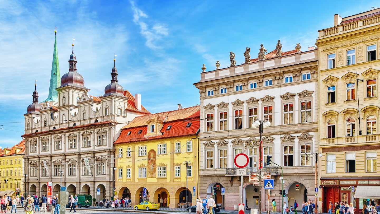 PRAGUE, CZECH REPUBLIC-SEPTEMBER 5, 2015:Main square of Prague's Mala Strana(Lesser Town of Prague).St. Nicholas Church and the adjacent building complex divides the square in an upper and lower part.  License Type: media  Download Time: 2022-12-01T02:47:17.000Z  User: mvm_lonelyplanet  Is Editorial: Yes  purchase_order: