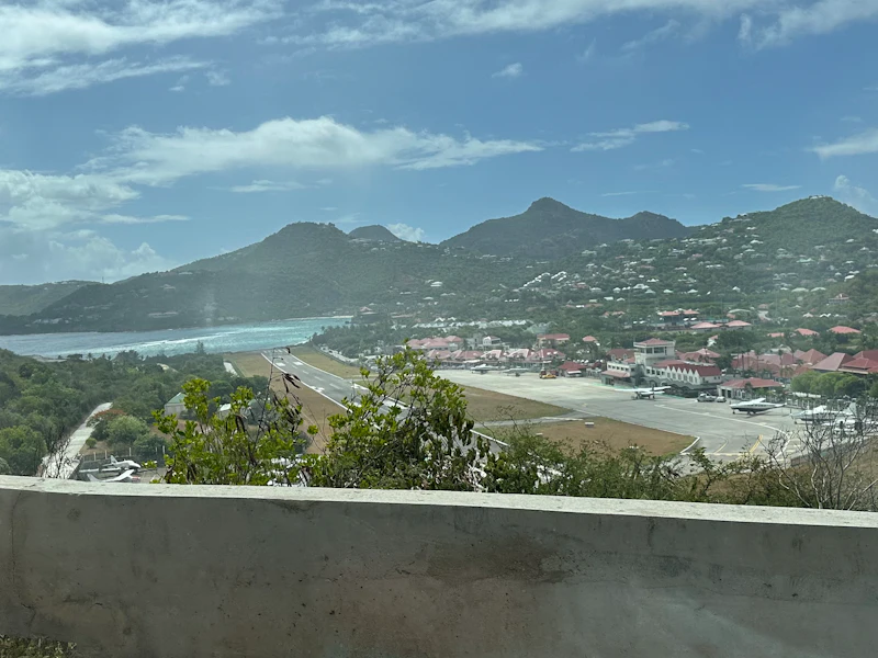 View of the Gustaf III airport runway in Saint Barthélemy. The ocean is at the end of the short runway.