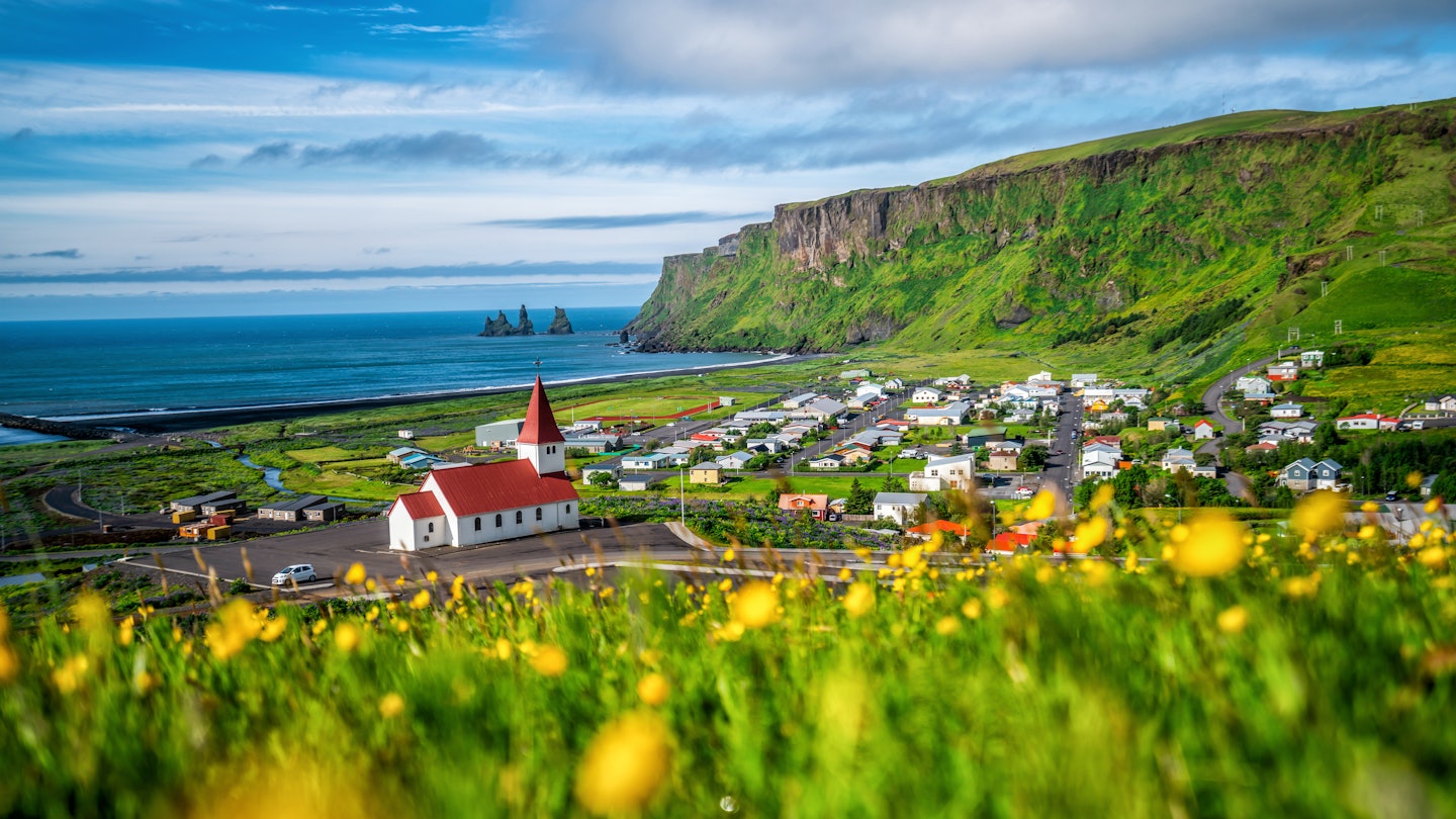 Beautiful town of Vik i Myrdal in Iceland in summer. The village of Vik is the southernmost village in Iceland on the ring road around 180 km southeast of Reykjavík., License Type: media, Download Time: 2024-07-04T06:33:56.000Z, User: mvm_lonelyplanet, Editorial: false, purchase_order: 56530, job: Global Publishing-WIP, client: The World 3, other: Virginia Moreno