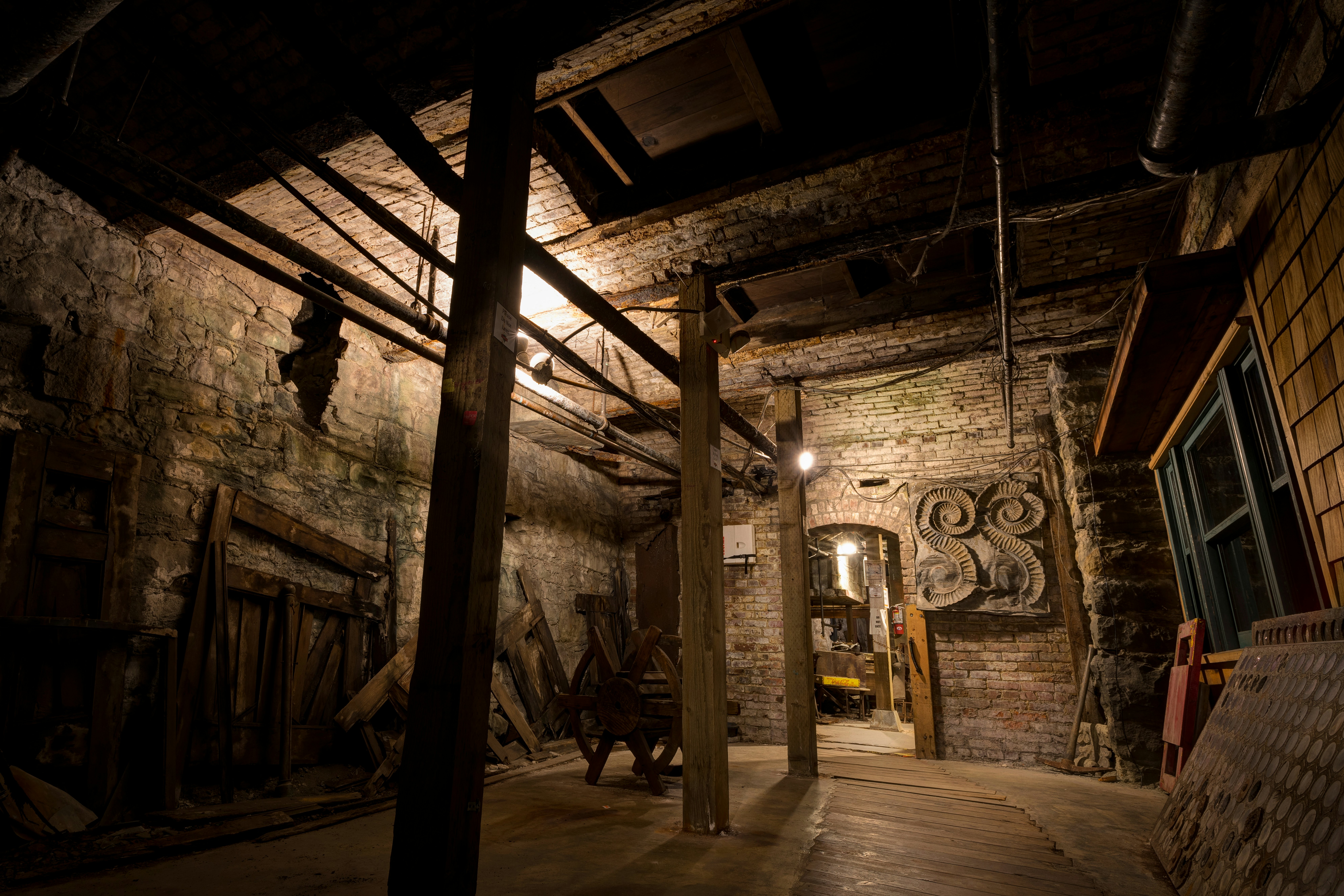 Seattle Underground Tour. Ground level in mid-19th century. After the streets were elevated, it became a basement.