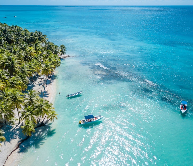Aerial view of Saona Island in Dominican Republuc. Caribbean Sea with clear blue water and green palms. Tropical beach. The best beach in the world., License Type: media, Download Time: 2025-07-06T09:51:58.000Z, User: pinkjozie64, Editorial: false, purchase_order: 56530 - Guidebooks, job: Global Publishing WIP, client: Experience Dominican Republic 1, other: Jo-anne Riddell