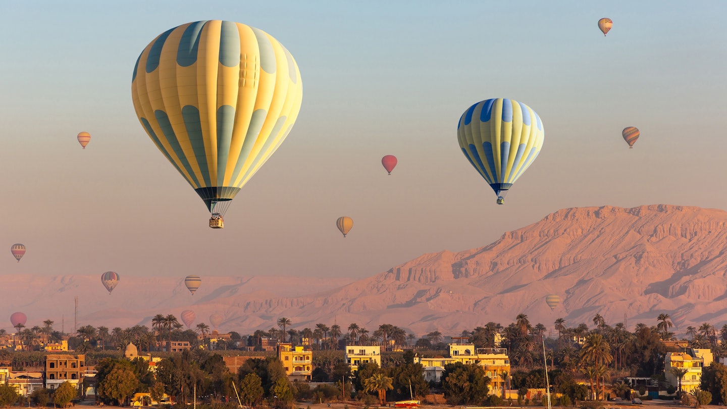Hot air balloons over Nile river and Valley of Kings in Luxor at sunrise in Egypt, License Type: media, Download Time: 2025-01-21T21:58:17.000Z, User: jewolfe_redventures, Editorial: false, purchase_order: 65020 - Marketing or Sales - this includes sponsored articles, job: Elsewhere, client: WIP, other: Jessica Wolfe