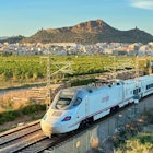 High-speed AVE train in motion on Valencia high-speed railway. Spanish Railways. RENFE SNCF - Spanish National Rail Network. Talgo 250 Dual train. April 12, 2023, Spain, Valencia region., License Type: media, Download Time: 2025-07-24T14:58:36.000Z, User: clairenaylor, Editorial: true, purchase_order: 65050 - Digital Destinations and Articles, job: online editorial, client: Spain trains, other: Claire Naylor
