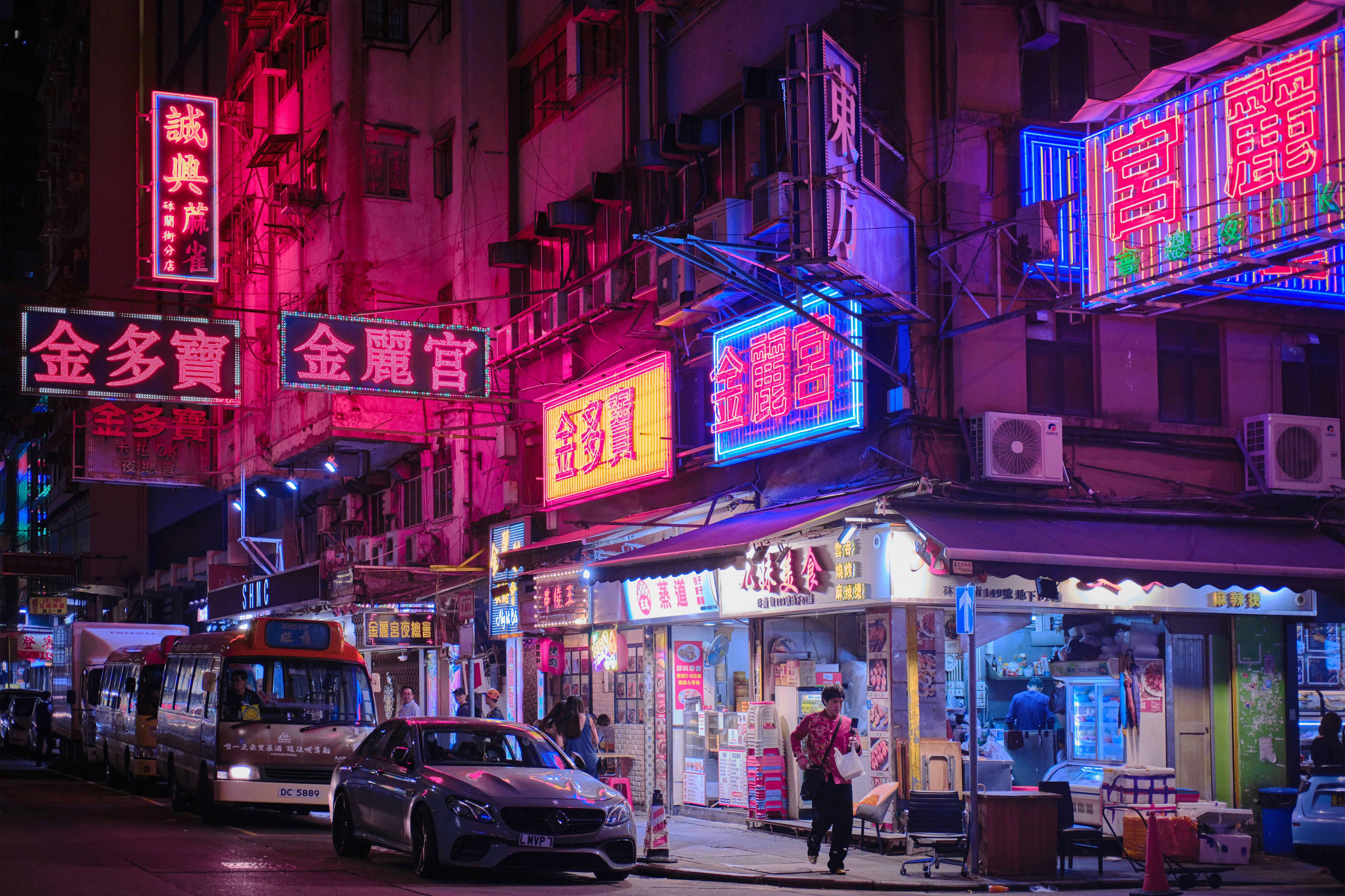 View of night streets, neon signboards of stores