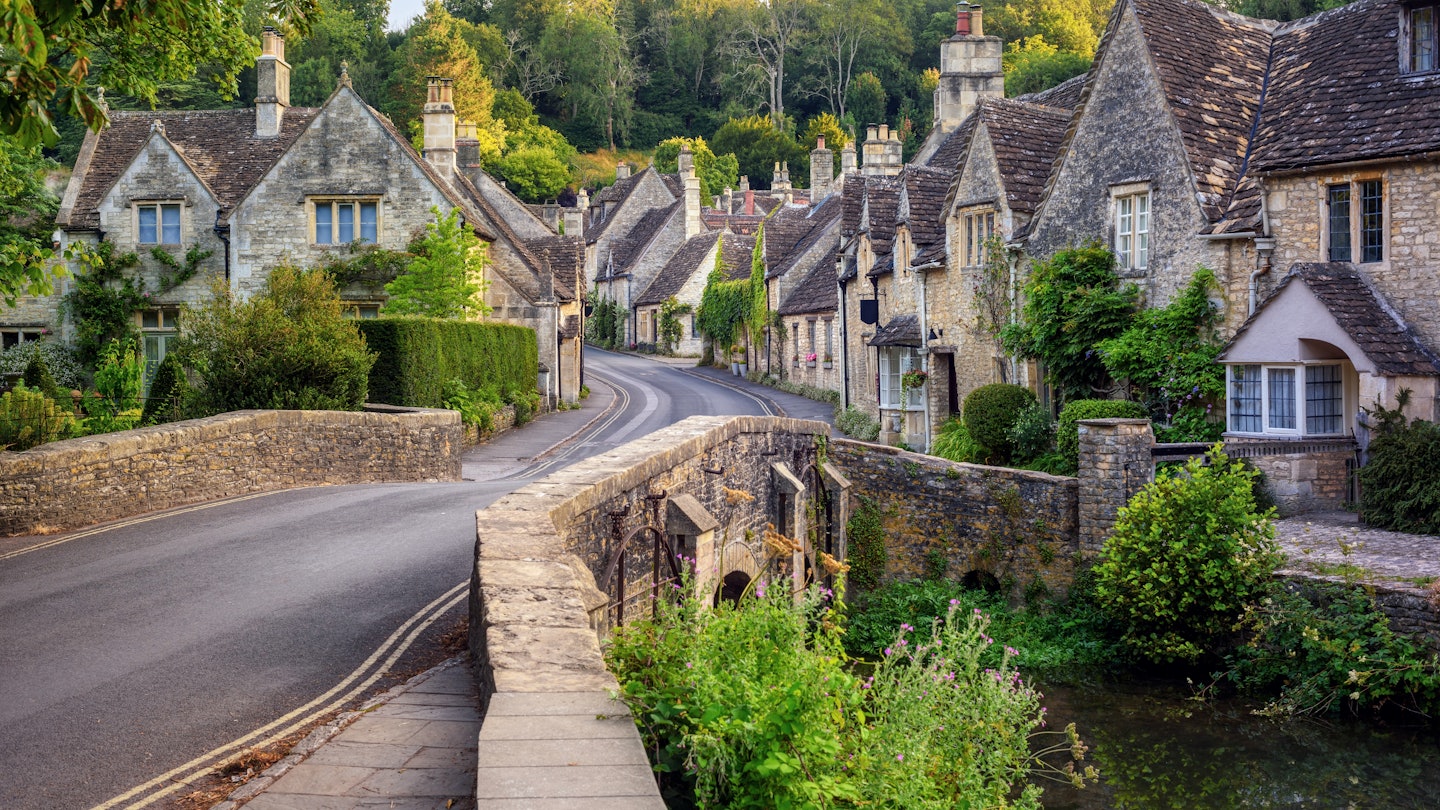 Traditional stone houses in Castle Combe village, one of the most picturesque villages in Cotswolds, England, United Kingdom, License Type: media, Download Time: 2025-07-01T17:45:53.000Z, User: rhylton_redventures, Editorial: false, purchase_order: 65050 - Digital Destinations and Articles, job: Lonely Planet, client: wip, other: Rhianydd Hylton