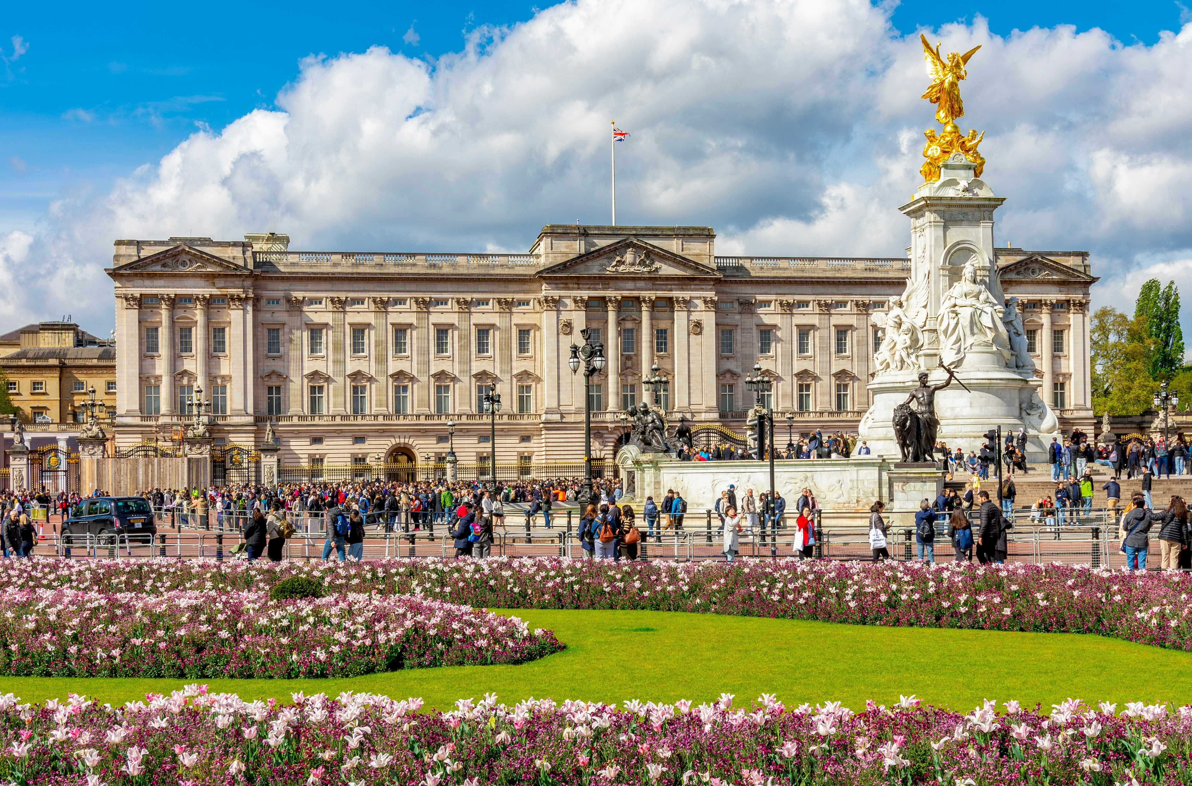 Queen Victoria Monument and the facade of Buckingham Palace, London, England.
