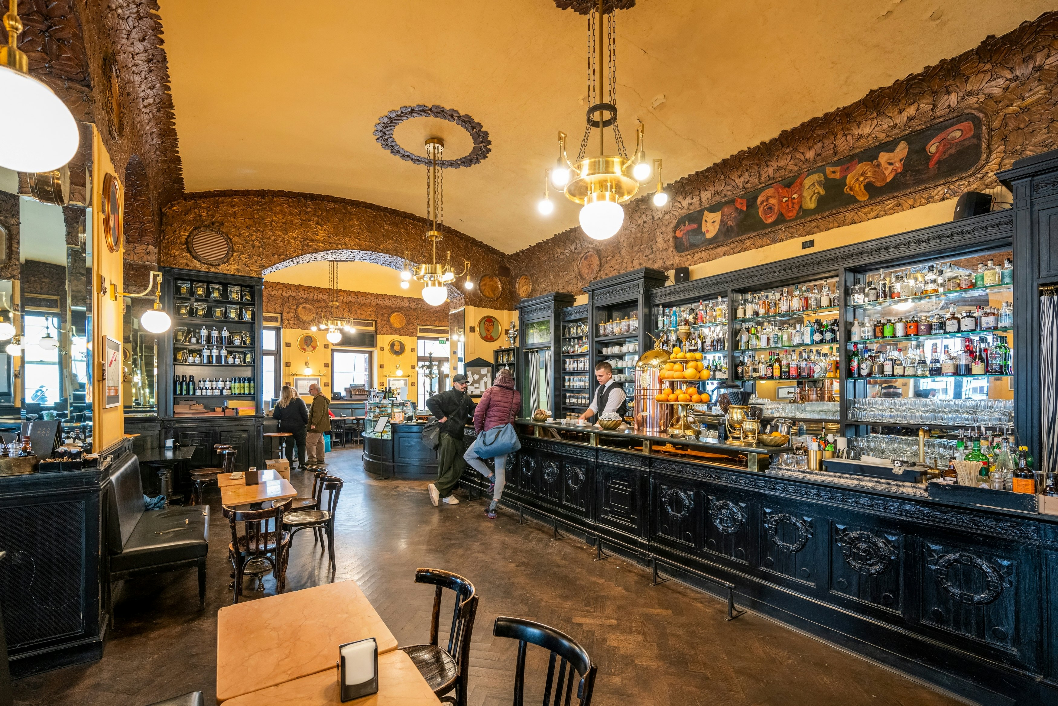 Interior view of the wood carvings and murals at the historic Antico Caffè San Marco, in Trieste, Italy.