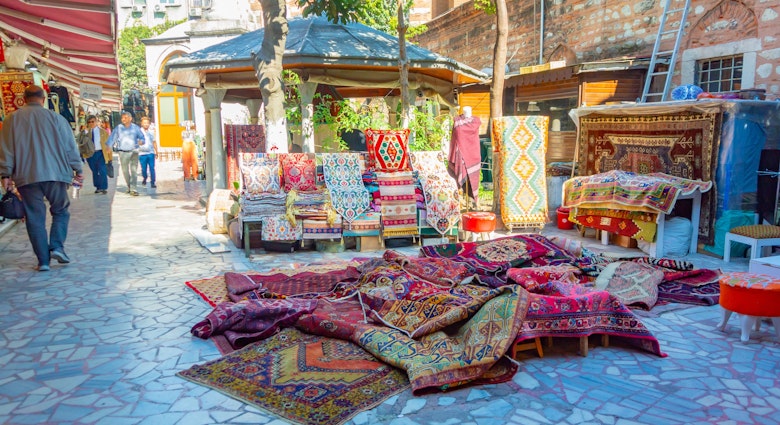Istanbul, Turkey - 12 Oct 2023, Colorful traditional Turkish carpets displayed outside a shop in the Grand Bazaar area of Istanbul, , License Type: media, Download Time: 2025-07-30T12:44:37.000Z, User: clairenaylor, Editorial: true, purchase_order: 65050 - Digital Destinations and Articles, job: Online editorial, client: Istanbul shops, other: Claire Naylor