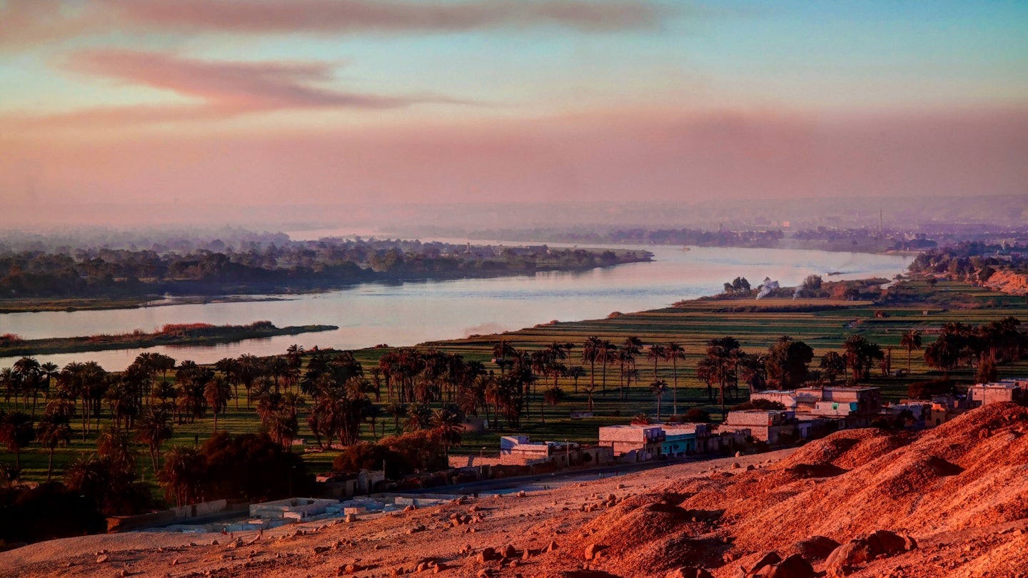 Sunset panorama view to Nile river from Beni Hasan archaeological site at Minya , Egypt, License Type: media, Download Time: 2025-07-21T16:36:47.000Z, User: clairenaylor, Editorial: false, purchase_order: 65050 - Digital Destinations and Articles, job: Online editorial, client: Egypt Nile cruise, other: Claire Naylor