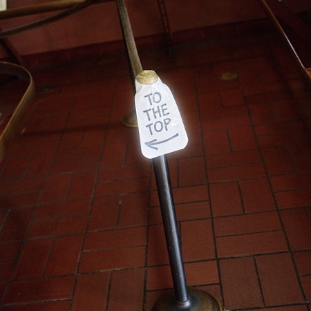 A sign inside Coit Tower.