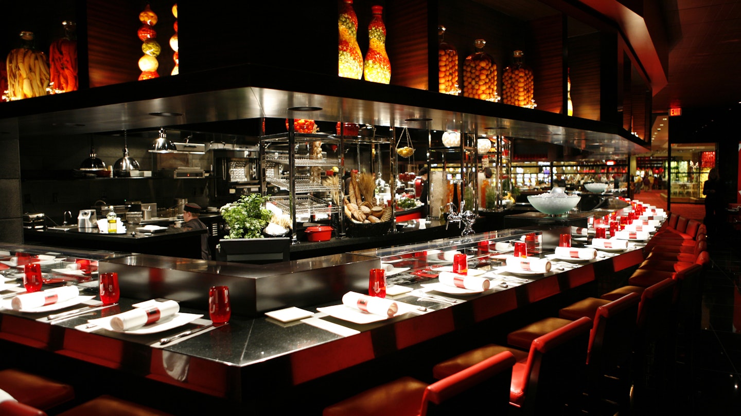 The black granite counter dining area looks upon the kitchen at L'Atelier de Joel Robuchon in the MGM Grand Hotel & Casino in Las Vegas, Nevada, December 6, 2006. (Photo by Michael Tercha/Chicago Tribune/Tribune News Service via Getty Images)
112962817
The black granite counter dining area looks upon the kitchen at L'Atelier de Joel Robuchon in the MGM Grand Hotel & Casino in Las Vegas, Nevada, December 6, 2006. (Photo by Michael Tercha/Chicago Tribune/Tribune News Service via Getty Images)
