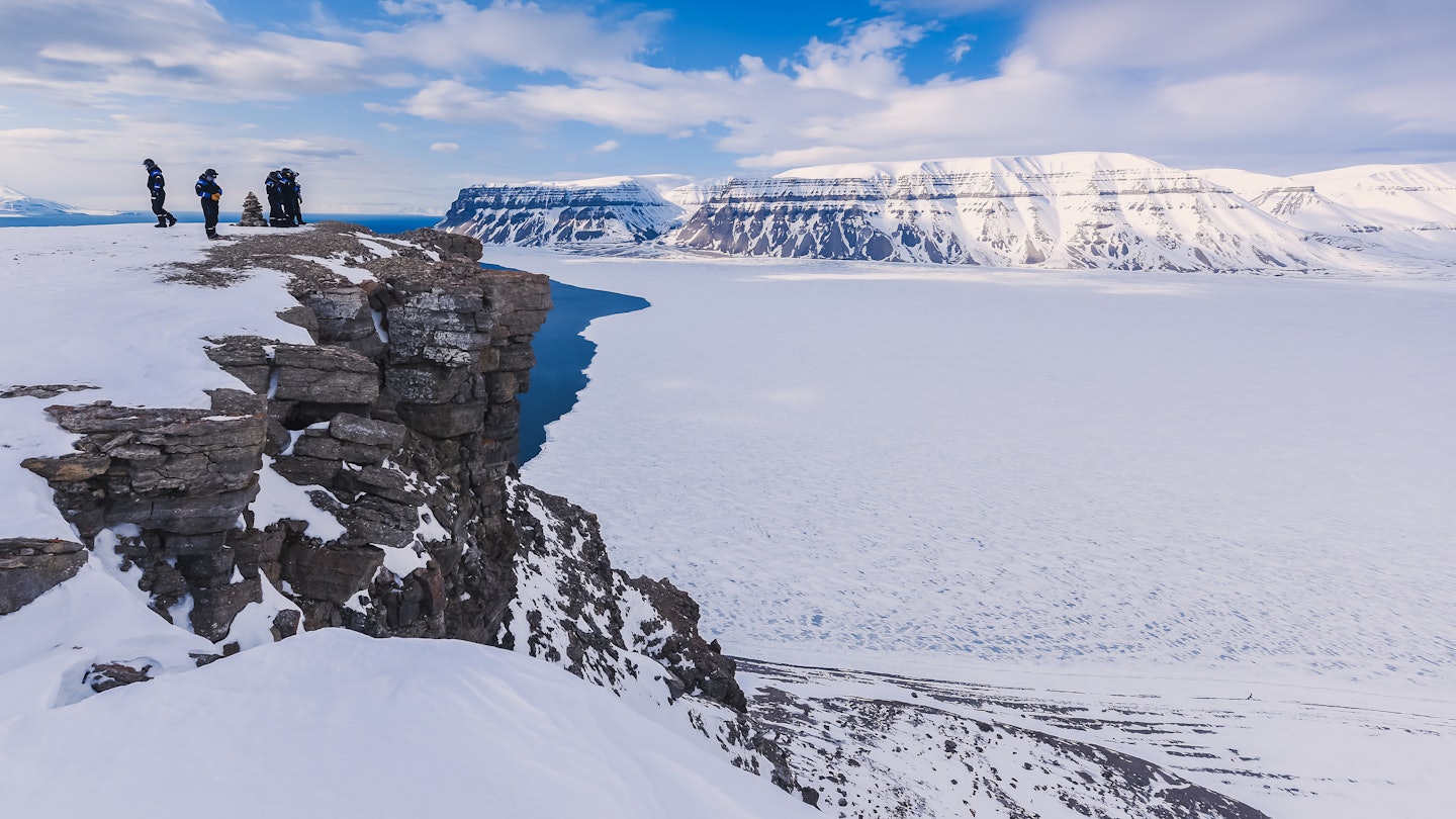The polar arctic Northern sky in Norway travel Svalbard in Longyearbyen Tempelfjorden mountains travel snowmobile tour License Type: media Download Time: 2024-05-24T05:31:42.000Z User: ceri_lp Is Editorial: No purchase_order:
