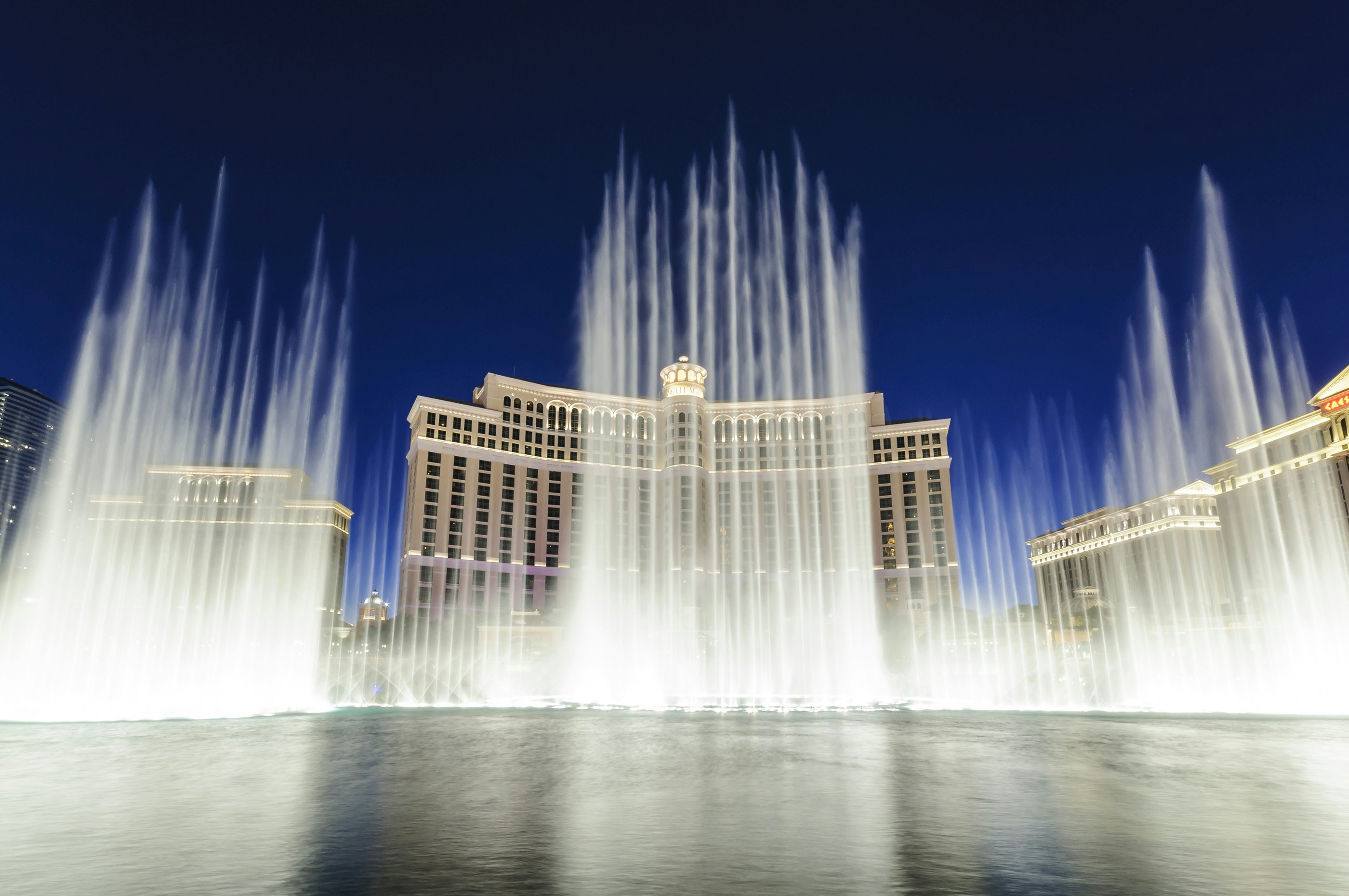 Water fountain show in front of the Bellagio Casino and Hotel at night on the strip