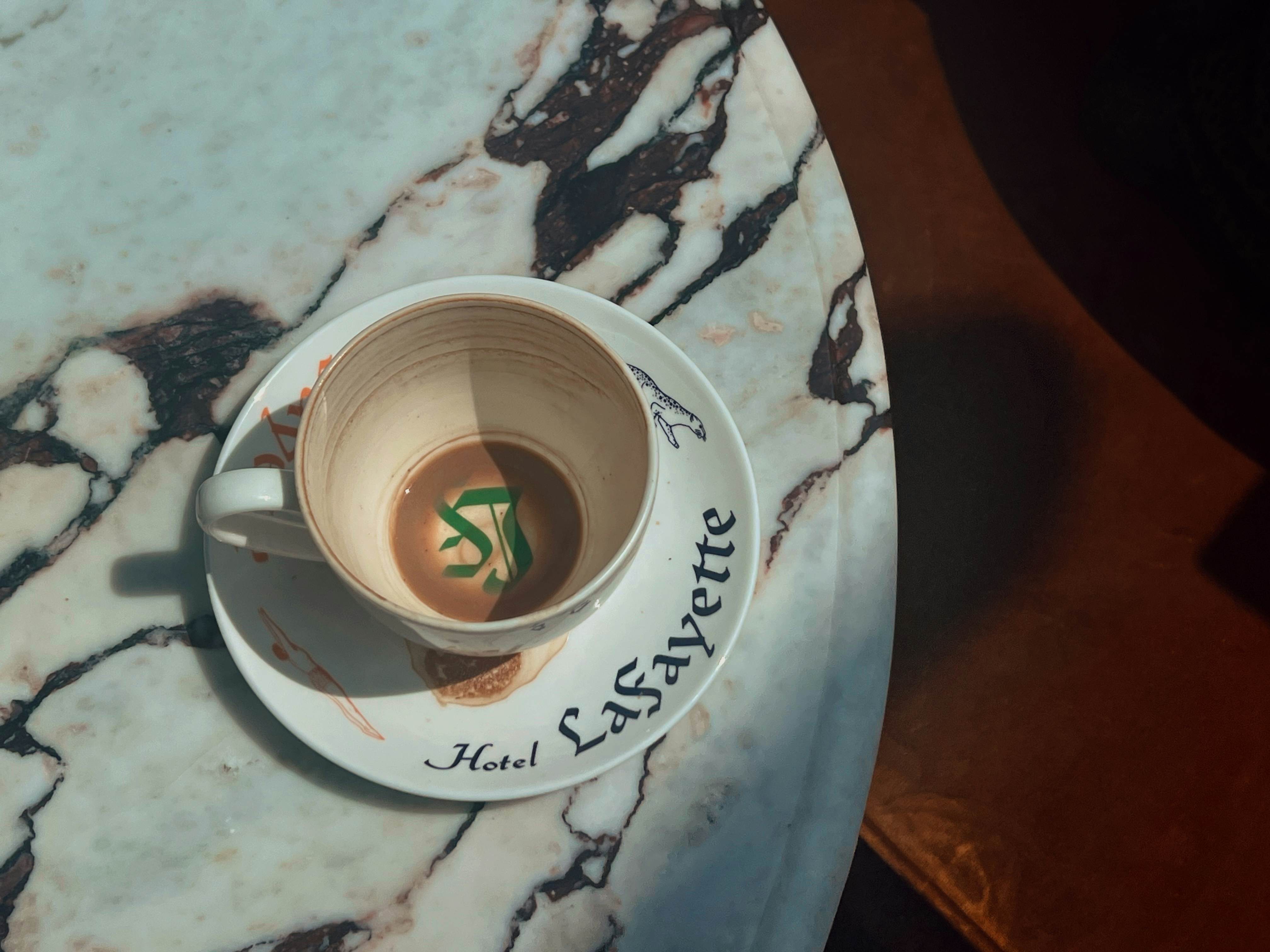 Empty coffee cup on a marble table.