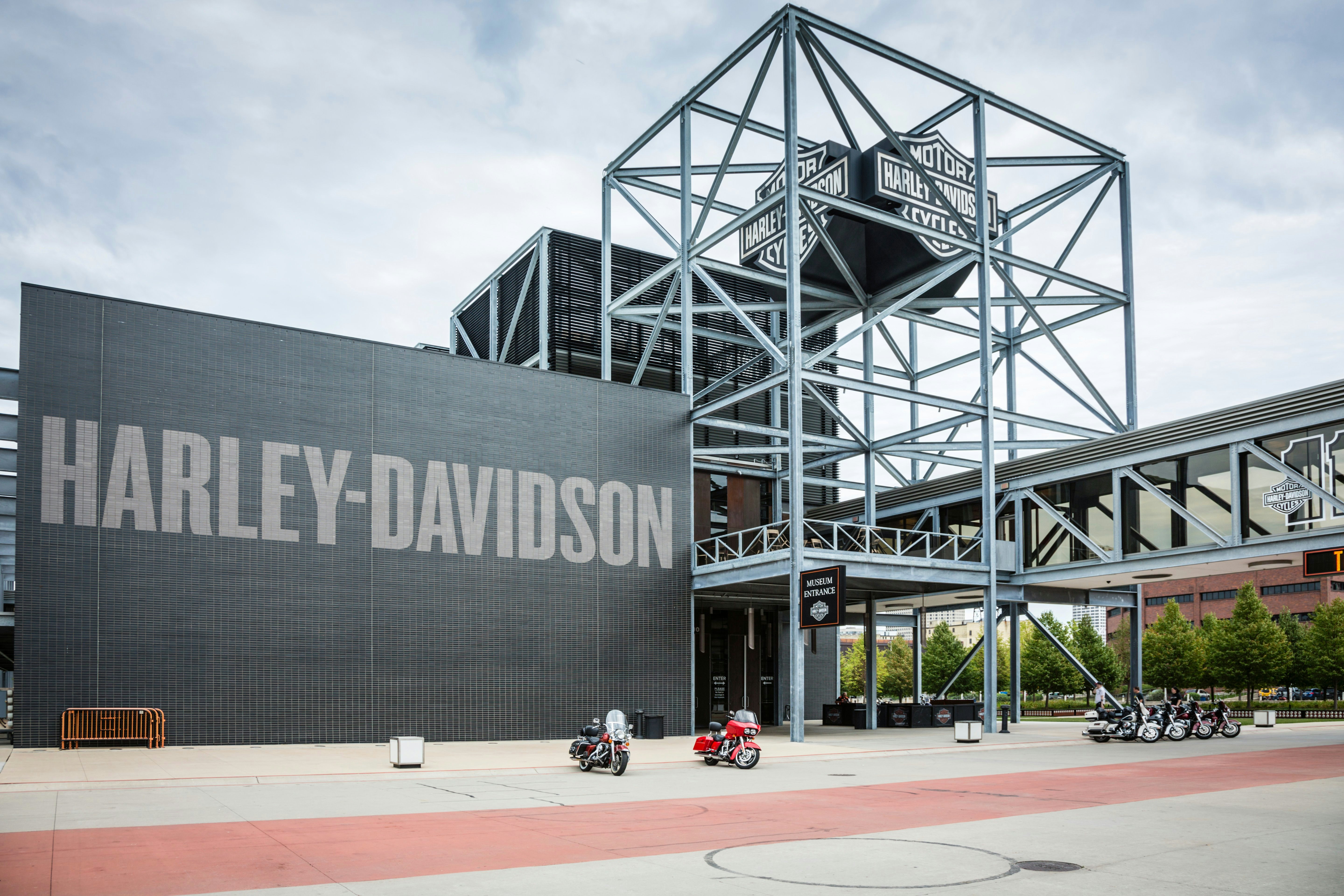 Modern looking museum with the words "Harley-Davidson" in large lettering on the outside wall.