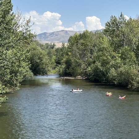 Boise river in foreground with background of mountains
