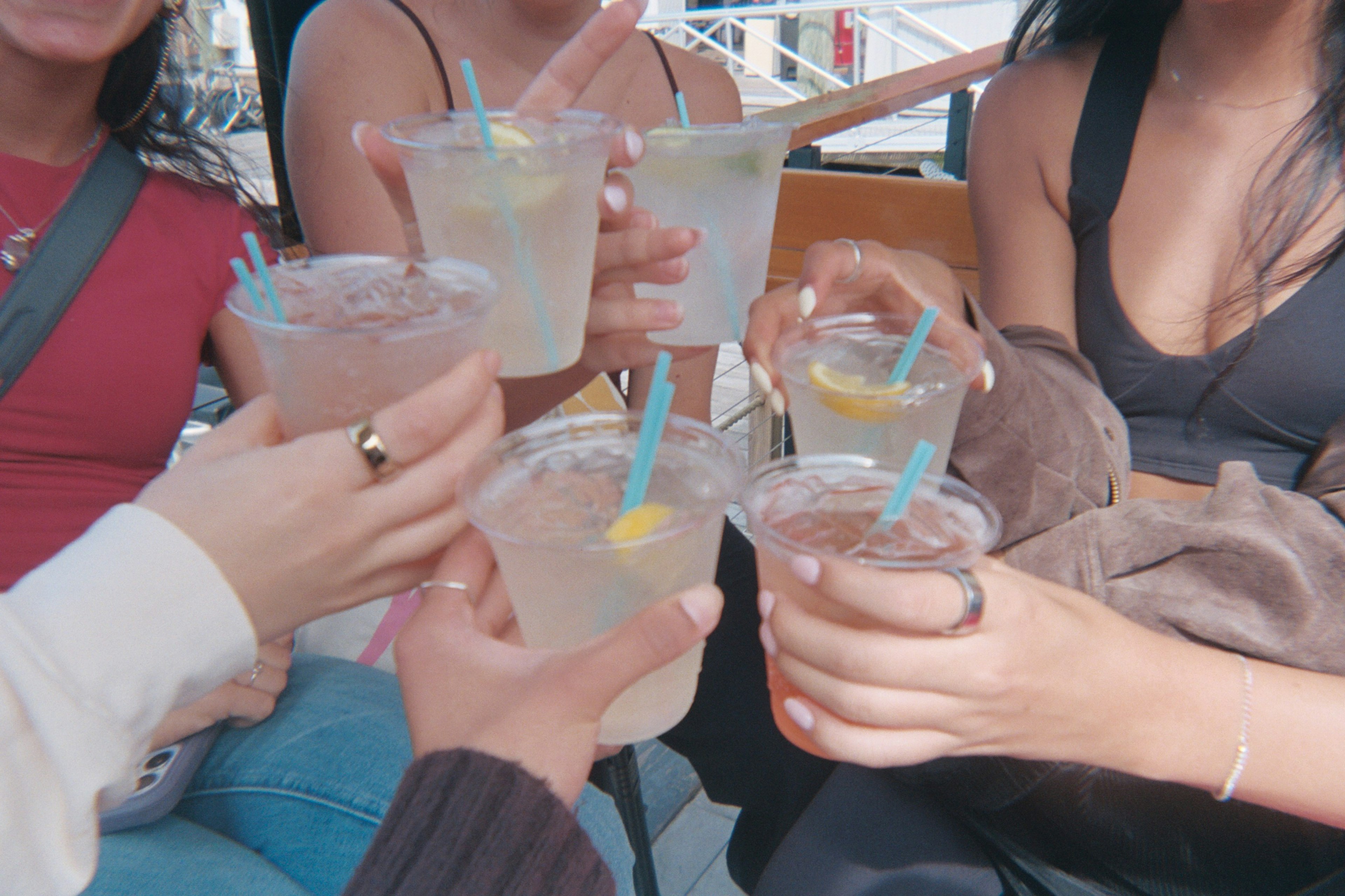 Serina and friends raising their glasses together