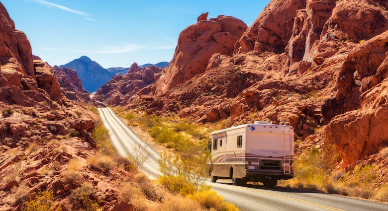 Valley of Fire, Nevada, USA - December 29, 2017 : Motorhome trailer traveling on the road in Valley of Fire in Nevada, License Type: media, Download Time: 2025-03-20T08:44:35.000Z, User: pinkjozie64, Editorial: true, purchase_order: 56530 - Guidebooks, job: Global Publishing WIP, client: South West USA 10, other: Jo-anne Riddell