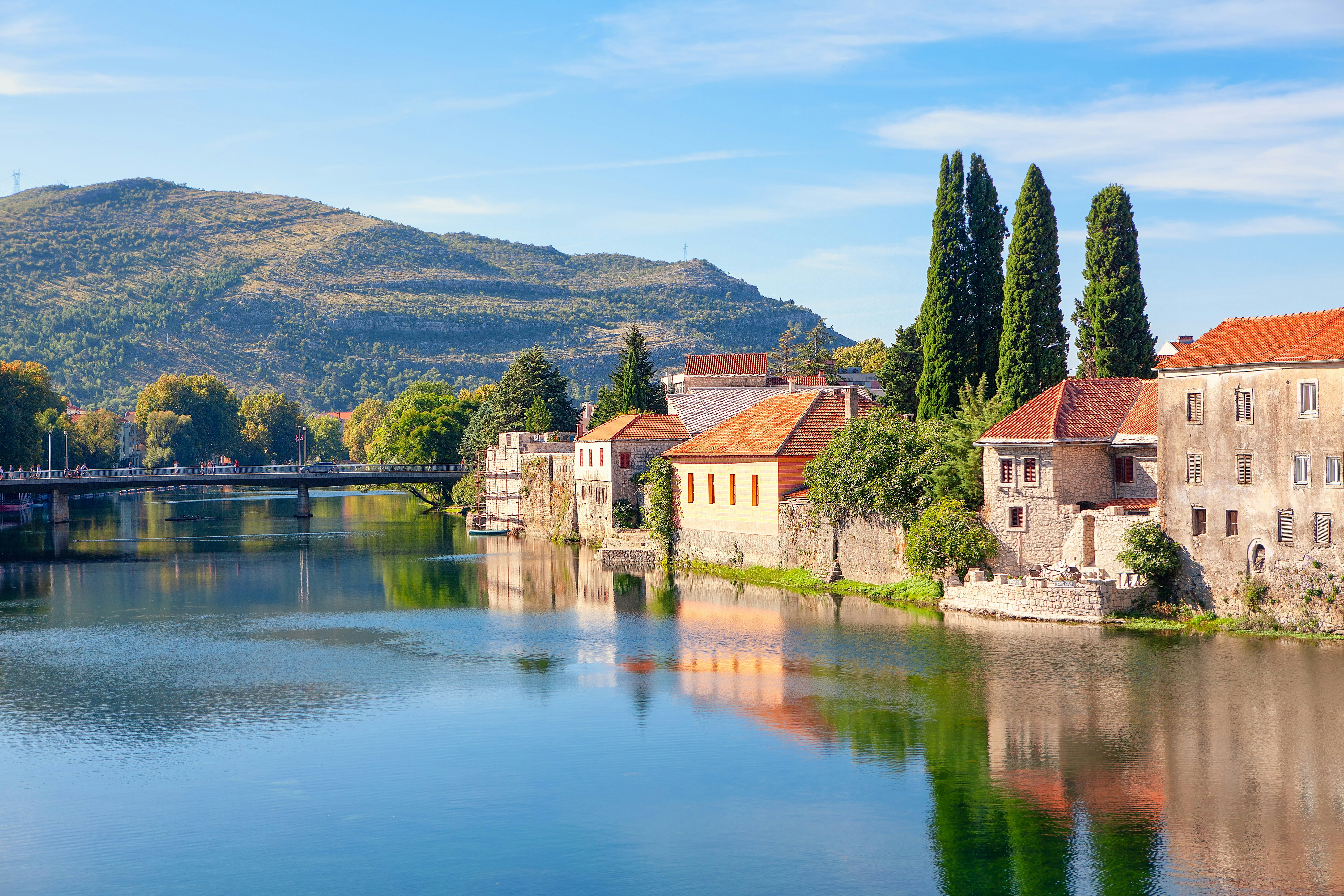 A medieval village beside a river.