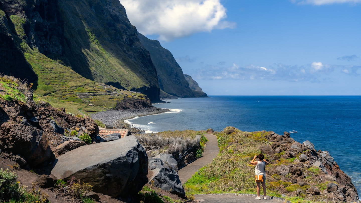 Santa Maria Madalena, Portugal, Madeira - June 22, 2023: Tourist visiting Achadas da Cruz, a small village only reachable by a cable car from top of the mountain., License Type: media, Download Time: 2025-02-13T14:49:27.000Z, User: Ppeterson948, Editorial: true, purchase_order: 56530 - Guidebooks, job: Global Publishing WIP, client: Global Publishing WIP, other: Pia Peterson Haggarty