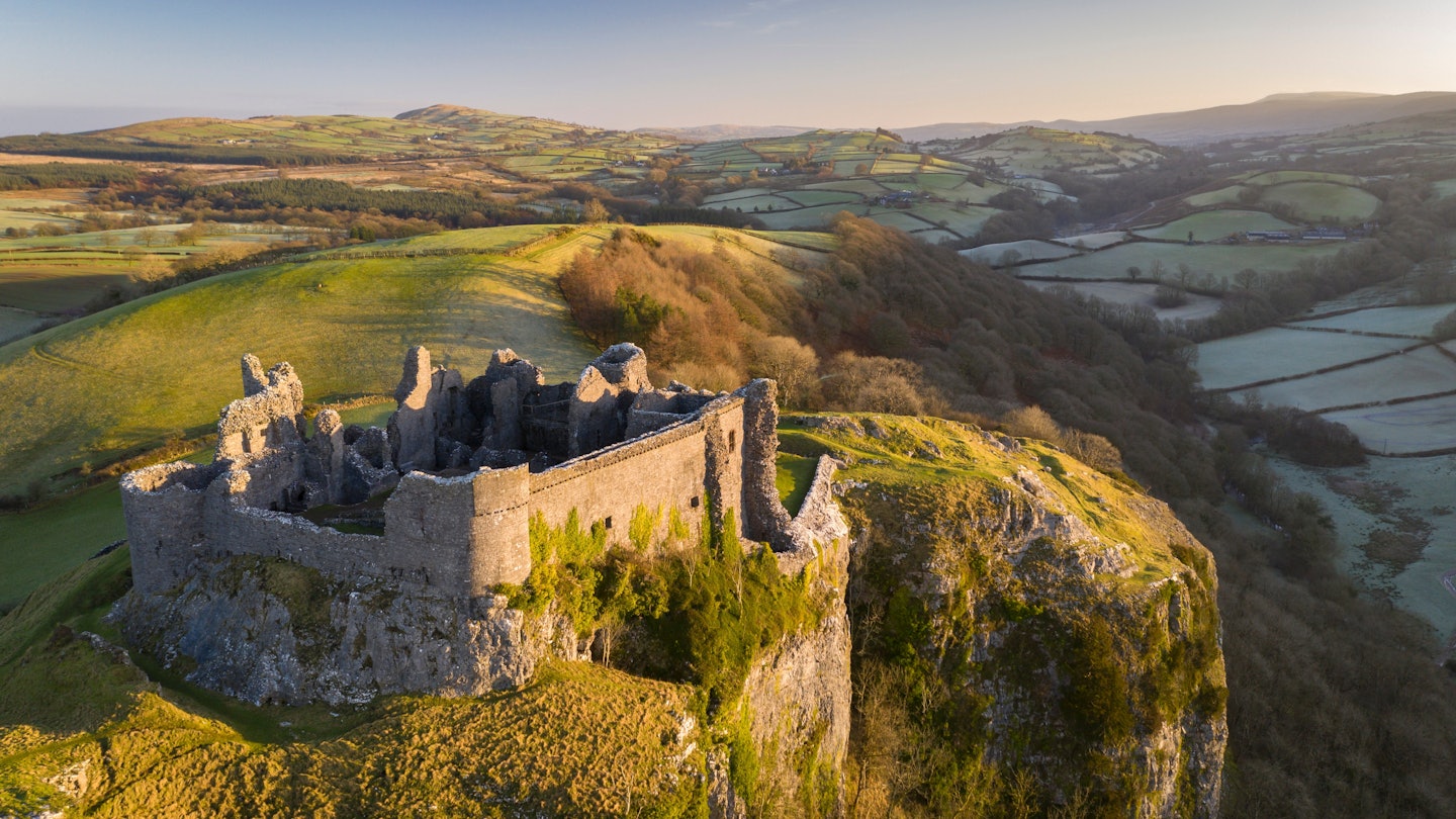 Aerial vista by drone of Carreg Cennen Castle, Brecon Beacons National Park, Carmarthenshire, Wales, United Kingdom, Europe, License Type: media, Download Time: 2025-08-29T19:18:41.000Z, User: joebindloss38, Editorial: false, purchase_order: 65050 - Digital Destinations and Articles, job: Online editorial, client: The 10 best castles to visit in Wales, other: Joe Bindloss