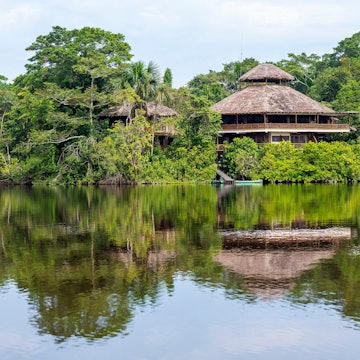 Amazon rainforest lodge reflection, Yasuni national park, Ecuador., License Type: media, Download Time: 2025-05-22T14:22:58.000Z, User: lonelyplanetmedia, Editorial: false, purchase_order: 65050 - Digital Destinations and Articles, job: Global Publishing WIP, client: Global Publishing WIP, other: Pia Peterson Haggarty // SS Comp Ingestion