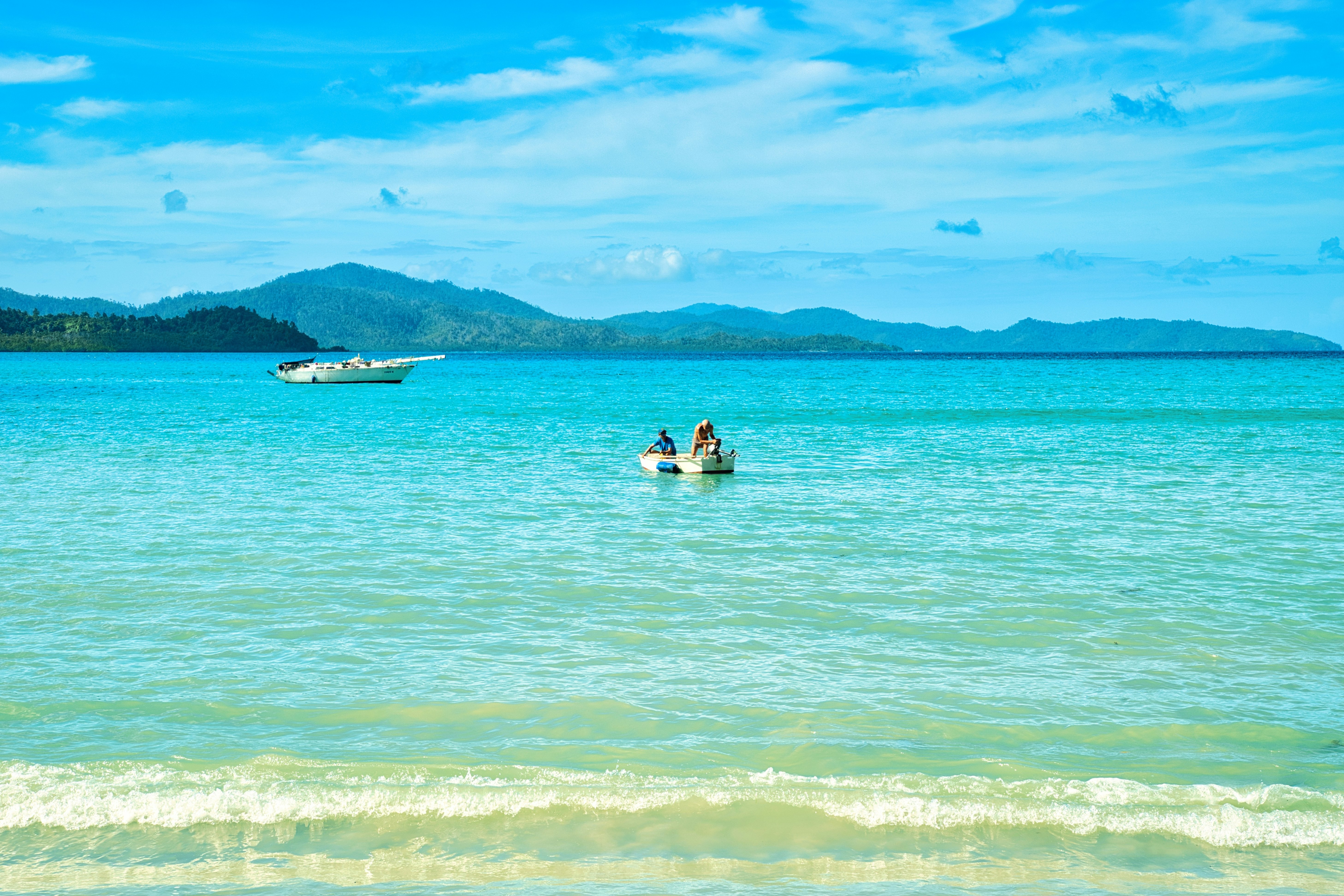 Beautiful coastline and turquoise water at the Port Barton Beach in Palawan
