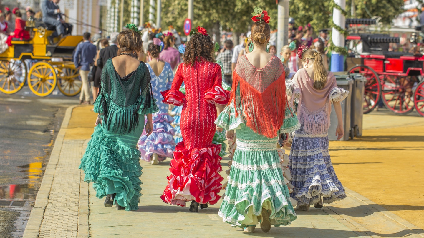 feria de abril; Shutterstock ID 299630906; purchase_order: 65050 - Digital Destinations and Articles; job: Online Editorial; client: When is the best time to go to Spain?; other: Joe Bindloss
299630906
Women in colorful dresses in the streets of Seville during the Feria de Abril festival.