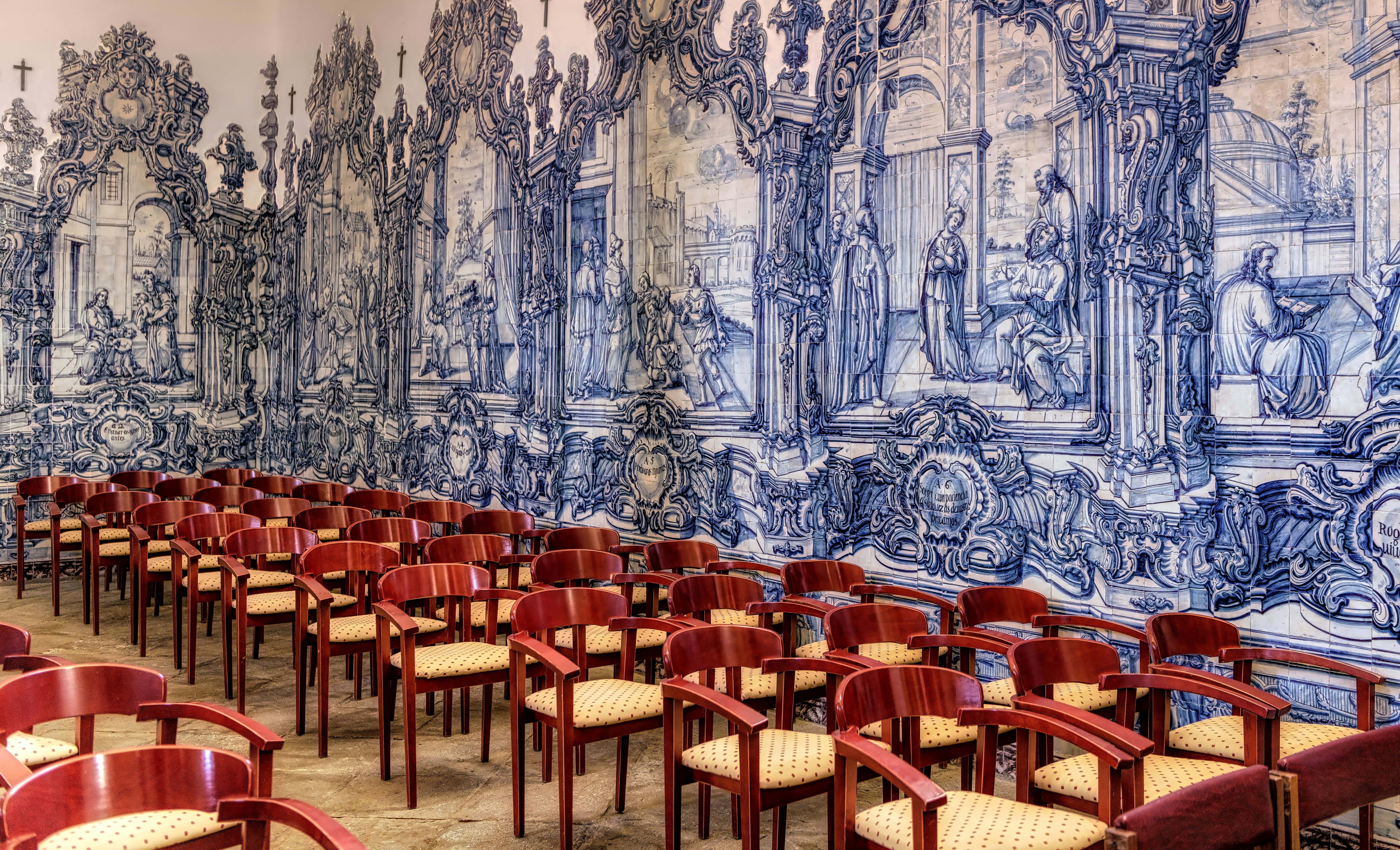 Interior of Church of Misericordia in Tavira, decorated with religious scenes in blue and white tile