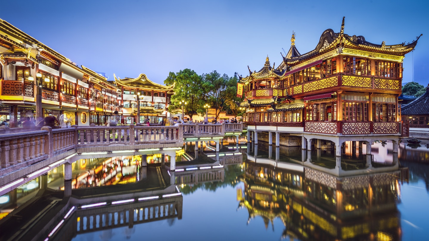Shanghai, China at Yuyuan Gardens.
anren, architecture, asia, asian, building, china, chinese, city, cityscape, contentment, cultural, destination, dusk, famous, garden, gardens, historic, historical, jie, lakeside, landmark, life, lights, night, nightlife, of, place, pond, reflection, restaurants, river, scene, scenery, scenic, shanghai, shops, skyline, traditional, travel, twilight, view, water, yu, yuyuan