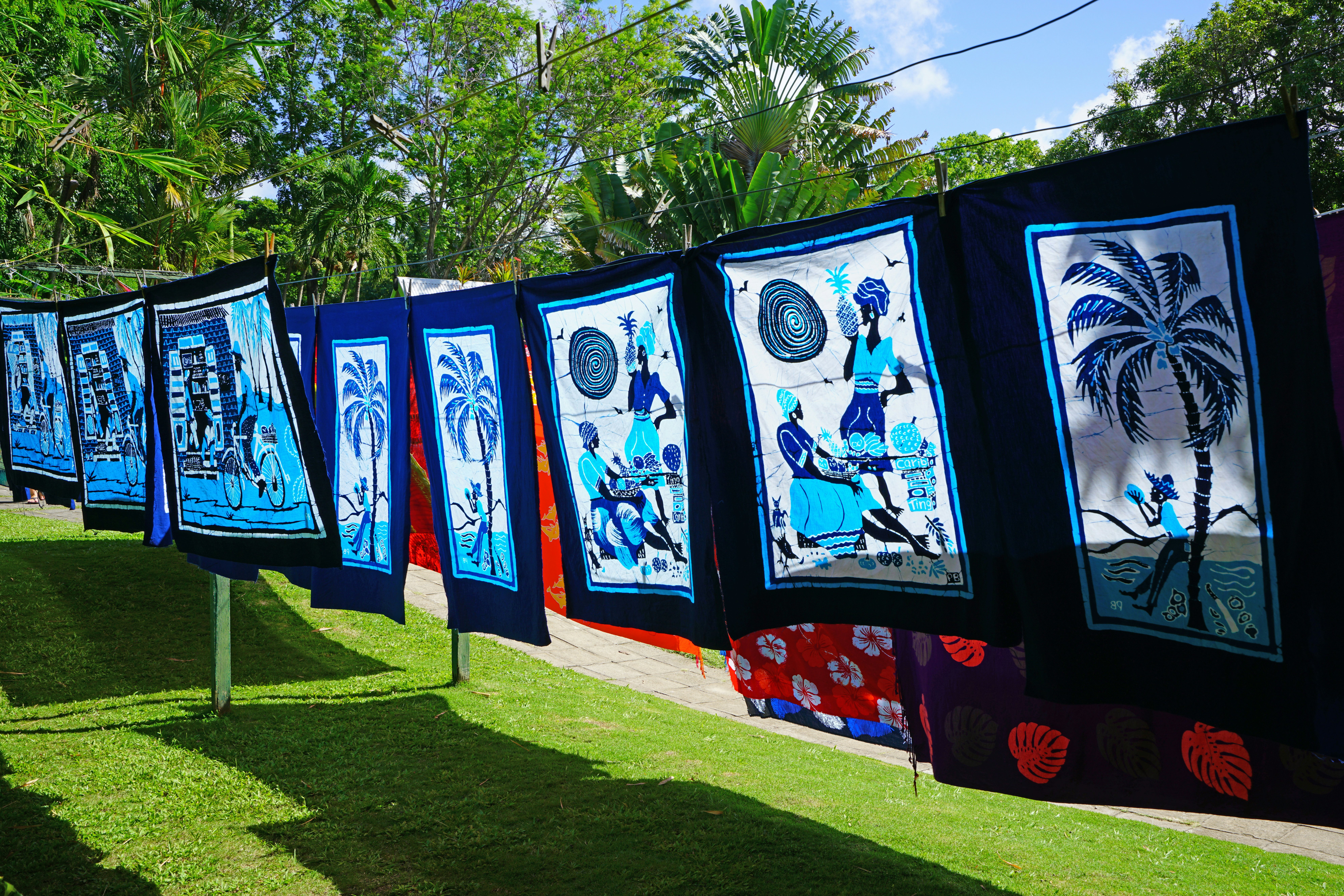 Fabrics hanging on a line at Caribelle Batik