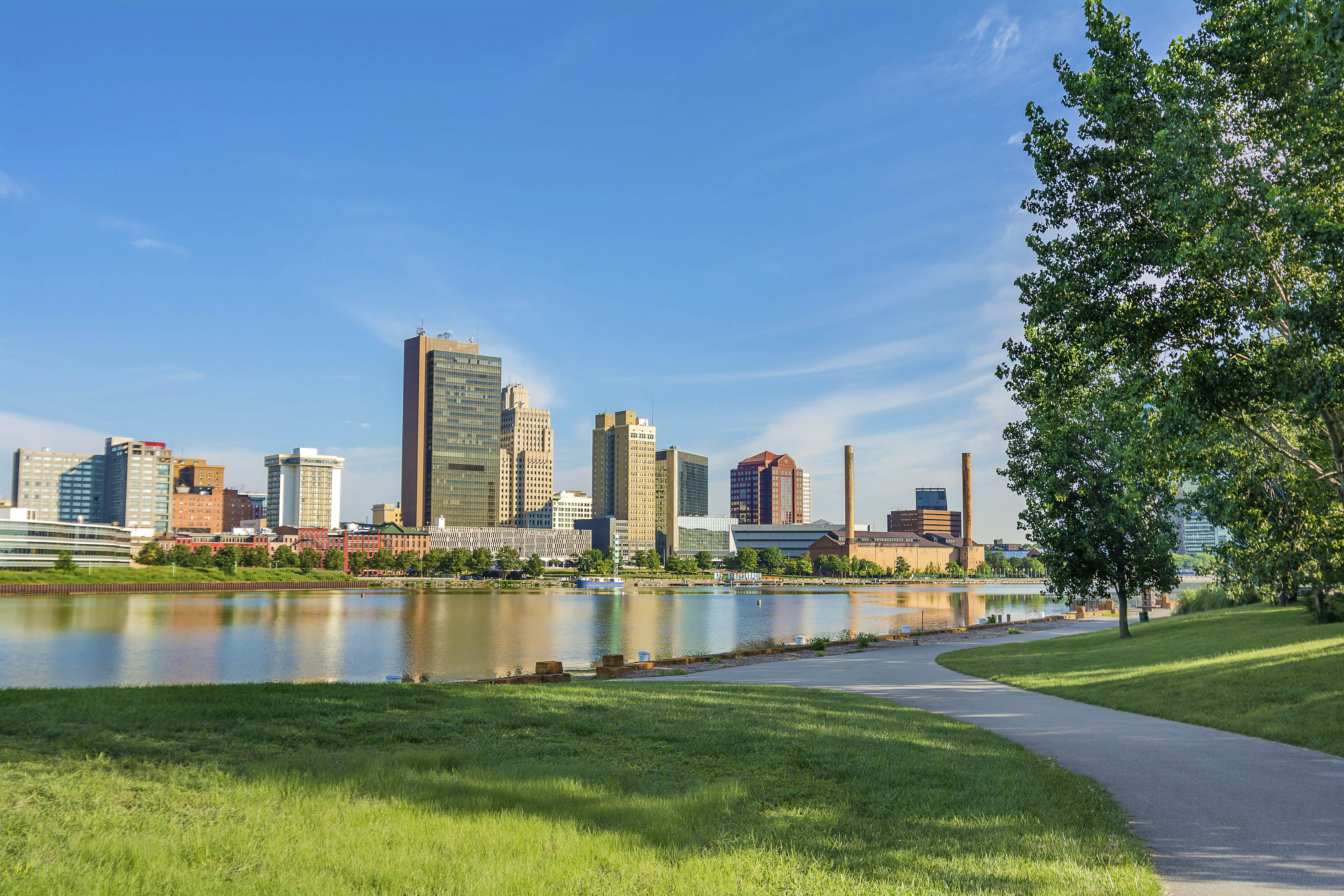 GettyImages-471696479.jpg
A city skyline reflected in a smooth lake surface