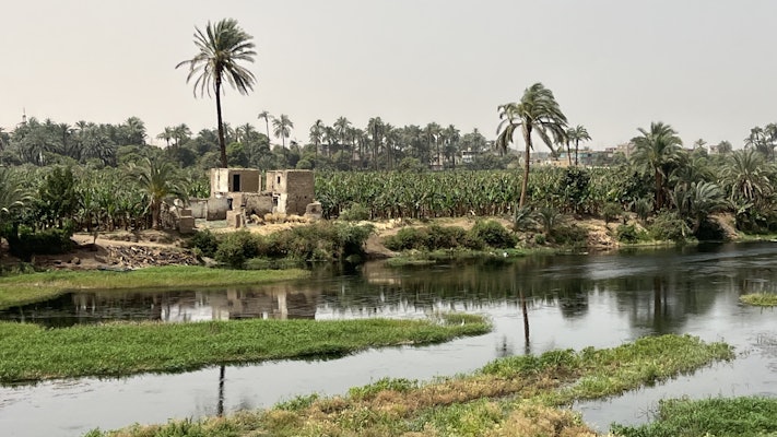The banks of the Nile River near Qena, as seen from a river cruise boat
