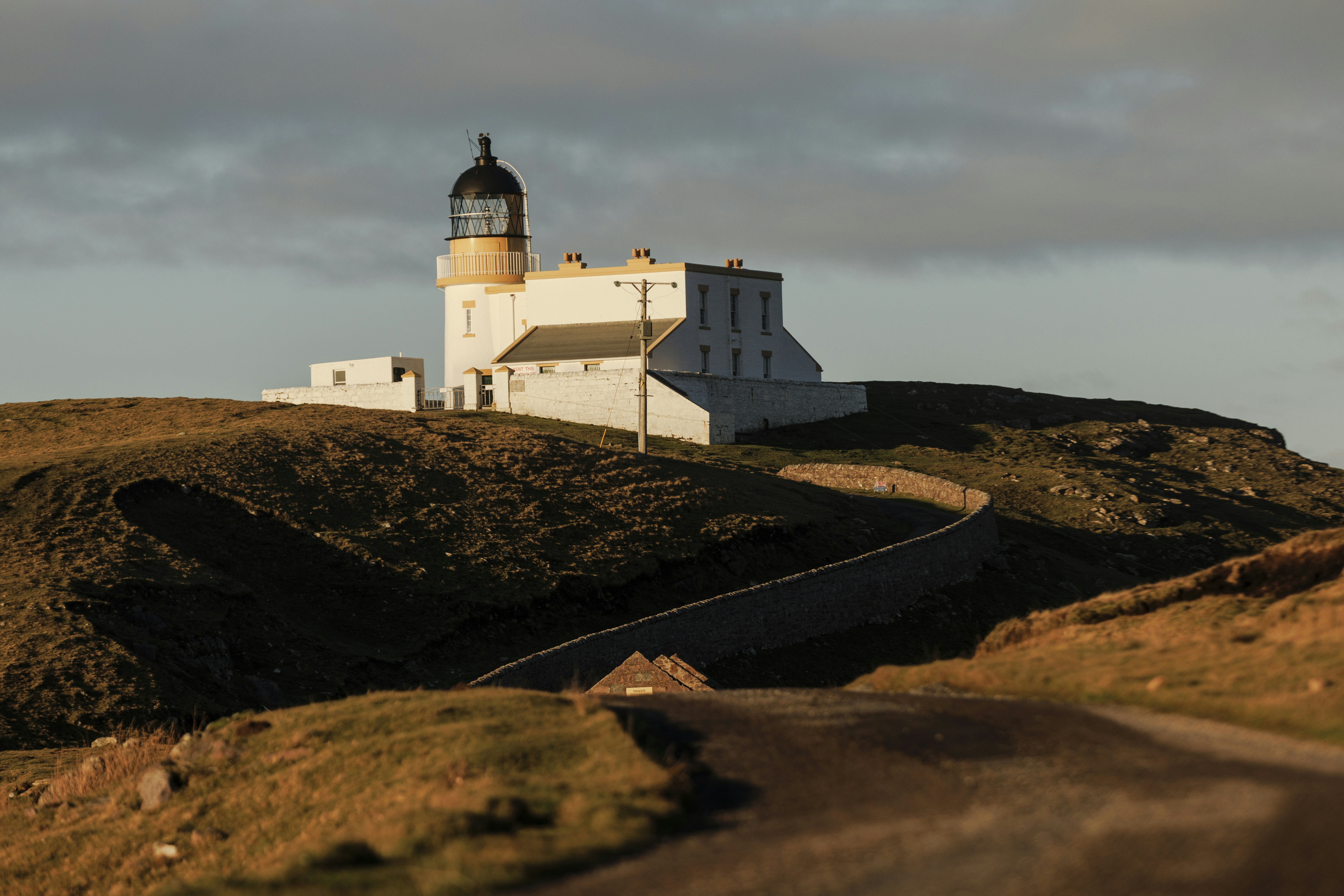 A view of Stoer Lighthouse and surrounds on the NC500 driving route in Scotland.