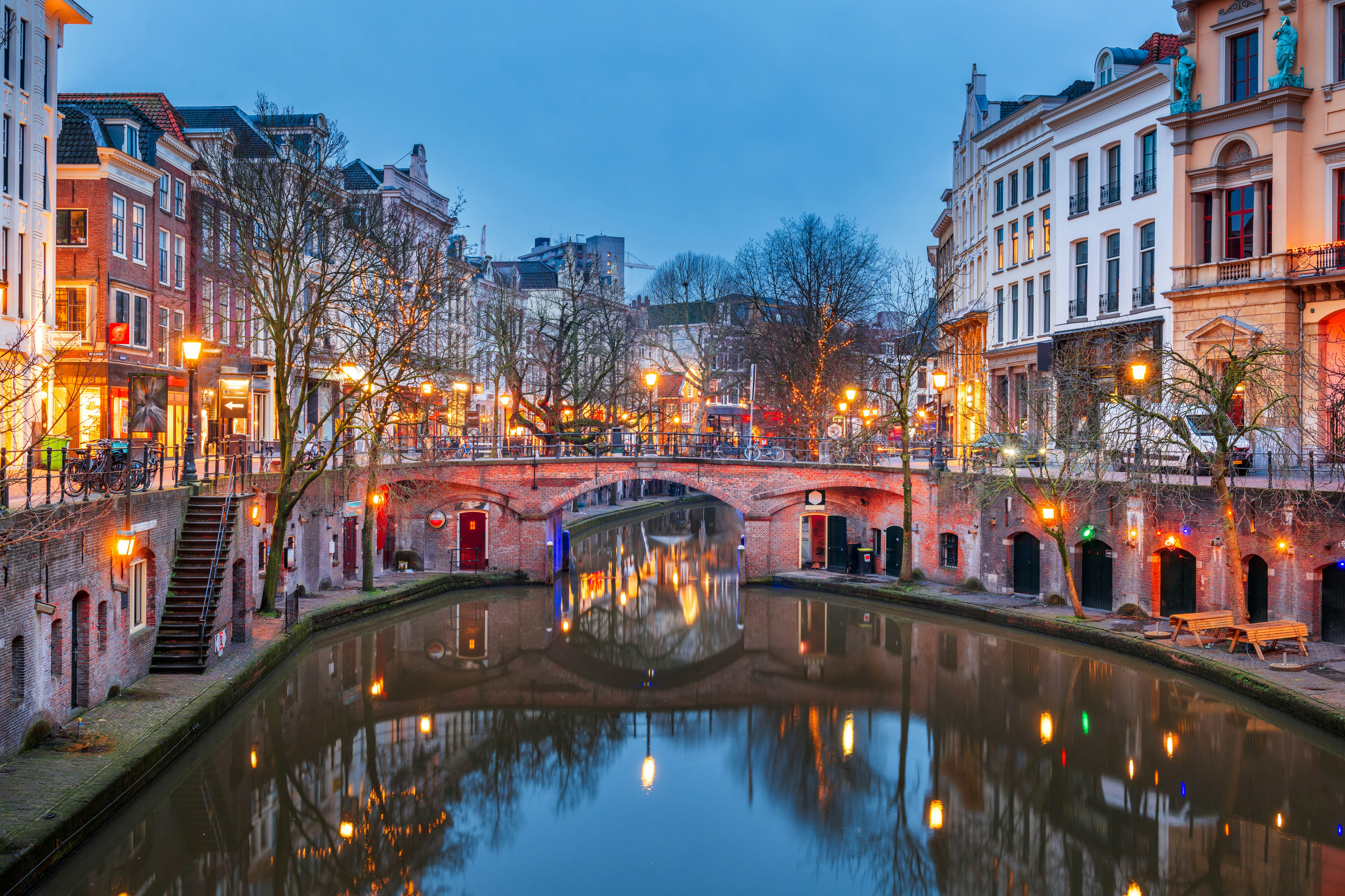 Utrecht, Netherlands canals and cityscape at twilight.  License Type: media  Download Time: 2024-01-29T04:23:45.000Z  User: claramonitto  Is Editorial: No  purchase_order:   