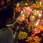 BANGKOK THAILAND - NOVEMBER 25 : Loy Krathong festival, Thai people buy flowers and candle to light and float on water to celebrate the Loy Krathong festival on November 25, 2015 in Bangkok, Thailand. License Type: media Download Time: 2024-03-11T10:32:31.000Z User: Norma.PrauseBrewer_LonelyPlanet Is Editorial: Yes purchase_order: