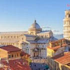 Cathedral (Duomo) and the Leaning Tower photographed from above the roofs, from the Grand Hotel Duomo - Pisa, Tuscany, Italy  License Type: media  Download Time: 2023-07-19T13:13:23.000Z  User: FergalCo  Is Editorial: Yes  purchase_order: