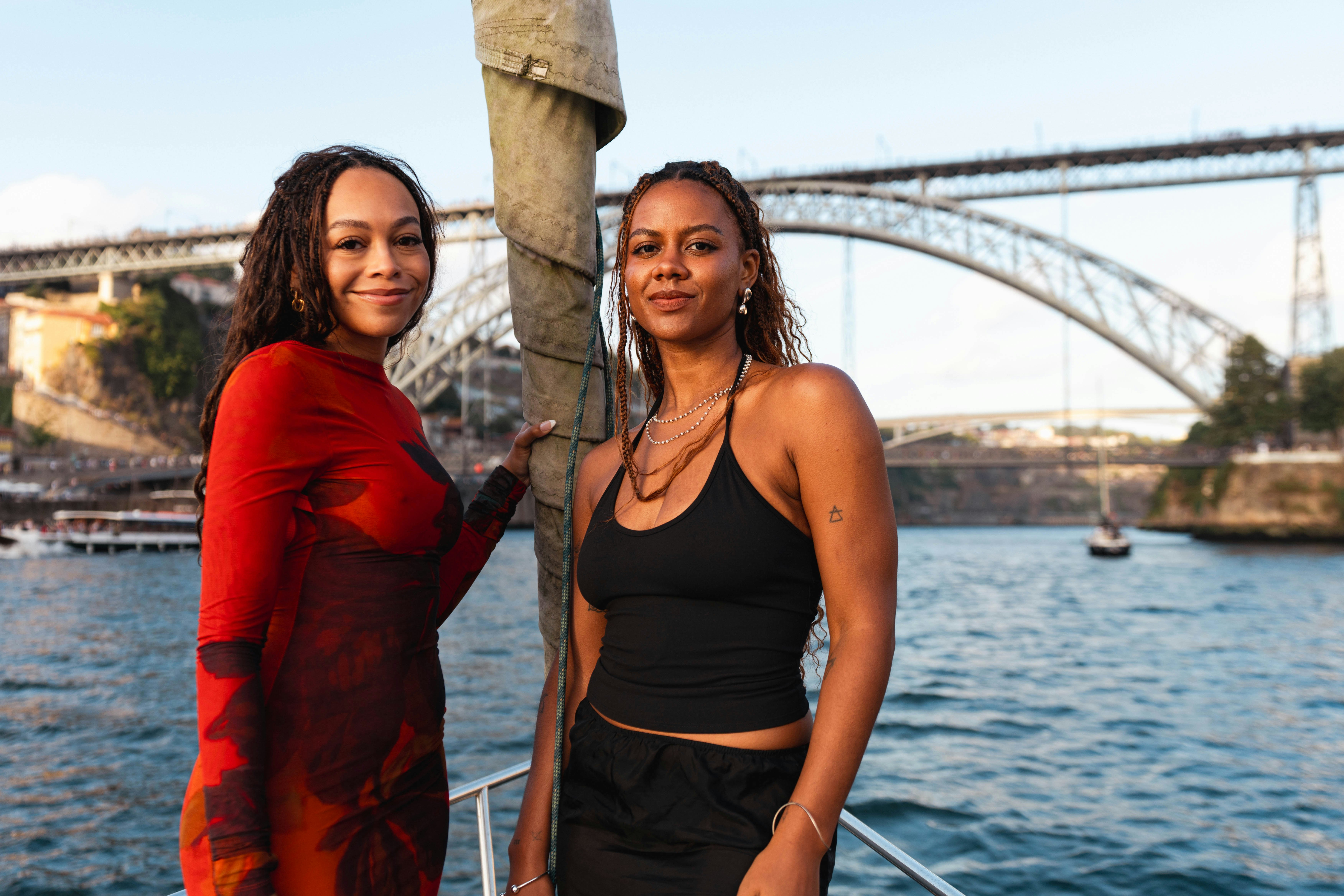 Hunter and Peyton beneath the Dom Luís I Bridge on the Douro River