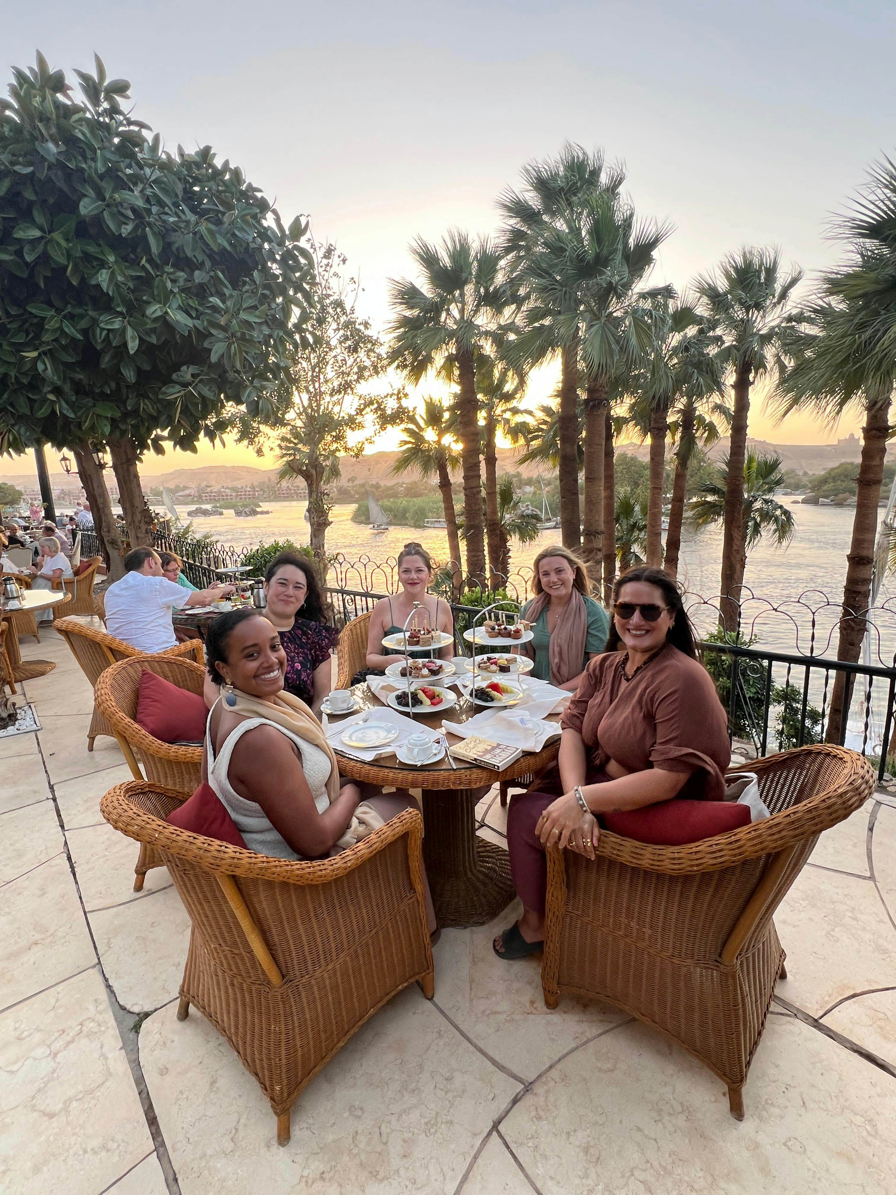Jessica Lockhart with traveling companions having high tea at the Cataract Hotel along the Nile in Egypt