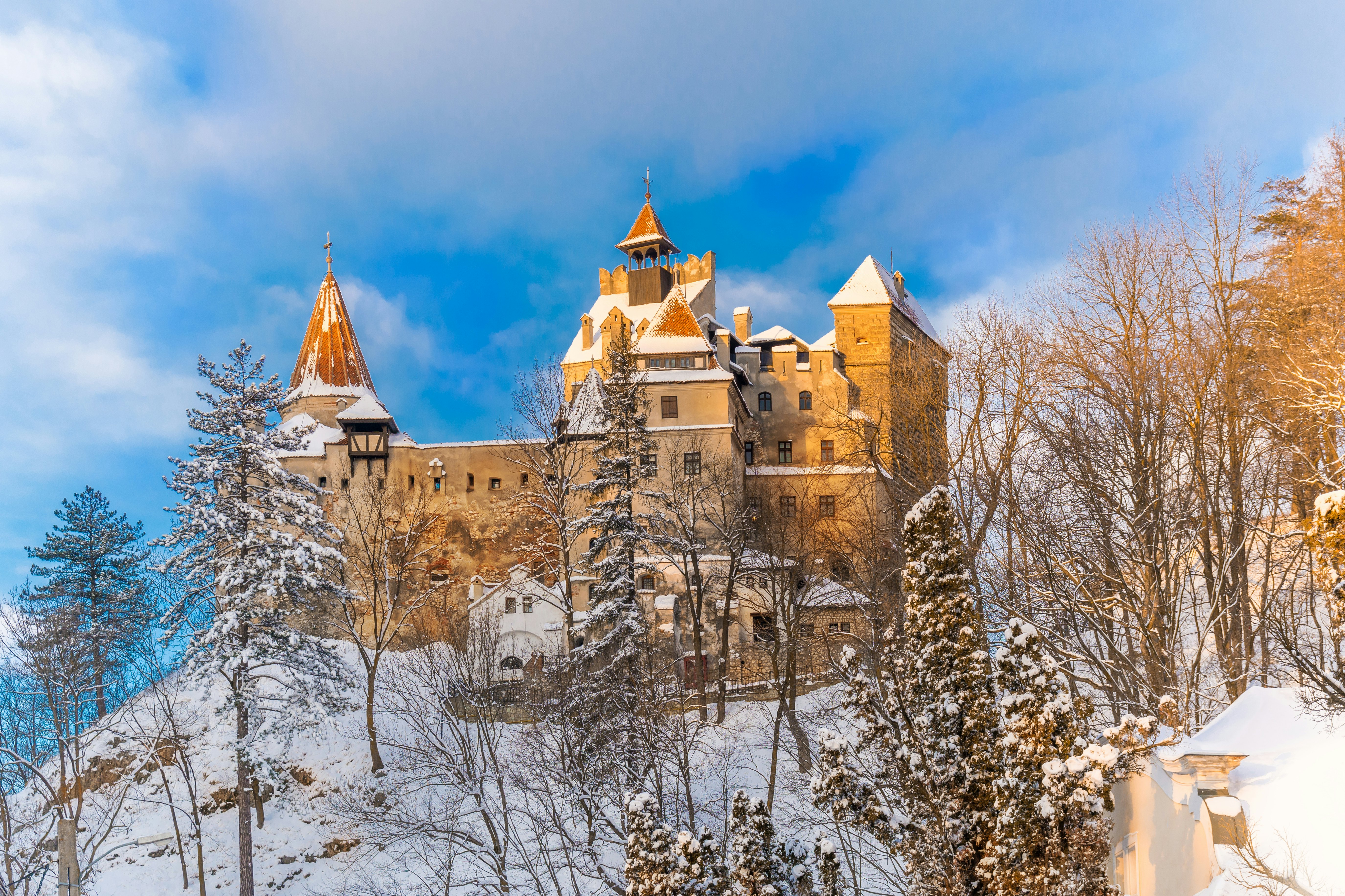 Bran Castle on a snow-covered hill
