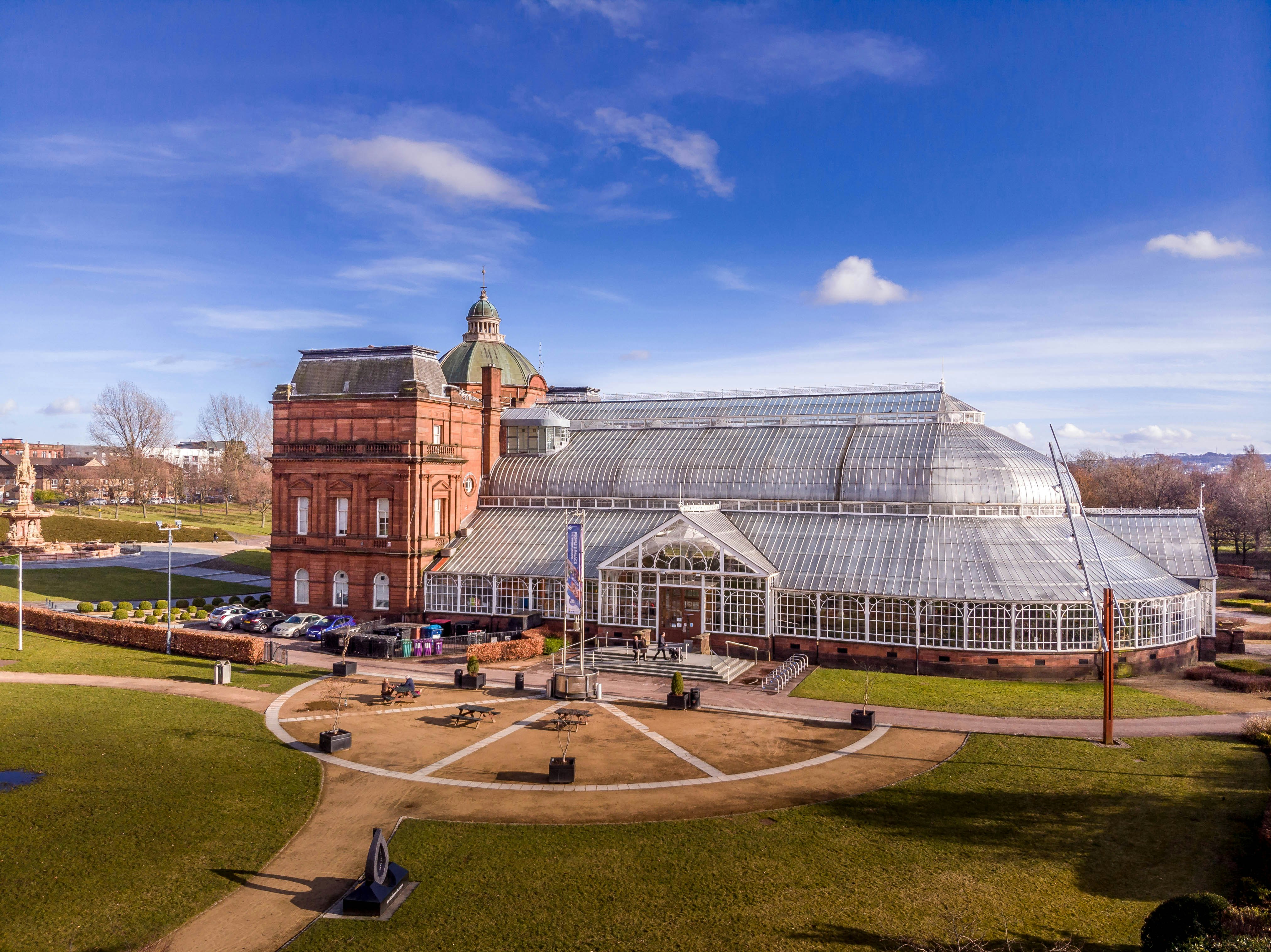 Glasgow Green and the glasshouse of the People's Palace, Glasgow, Scotland.