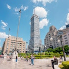 Mexico City, Mexico; August 06 2022: view to the latin tower from the esplanade of fine arts, under blue sky., License Type: media, Download Time: 2025-05-20T22:41:32.000Z, User: mvm_lonelyplanet, Editorial: true, purchase_order: 56530 - Guidebooks, job: Global Publishing, client: Mexico city sheetmap_2025, other: María Virginia Moreno