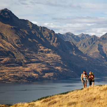 Lake Wakatipu Queenstown fit extreme Caucasian male and female young hiking couple walking mountain travel trail outdoors The Remarkables Otago New Zealand, License Type: media, Download Time: 2025-02-20T17:57:35.000Z, User: rhylton_redventures, Editorial: false, purchase_order: 65030 - Newsletter, job: Lonely Planet WIP, client: Lonely Planet WIP, other: Rhianydd Hylton