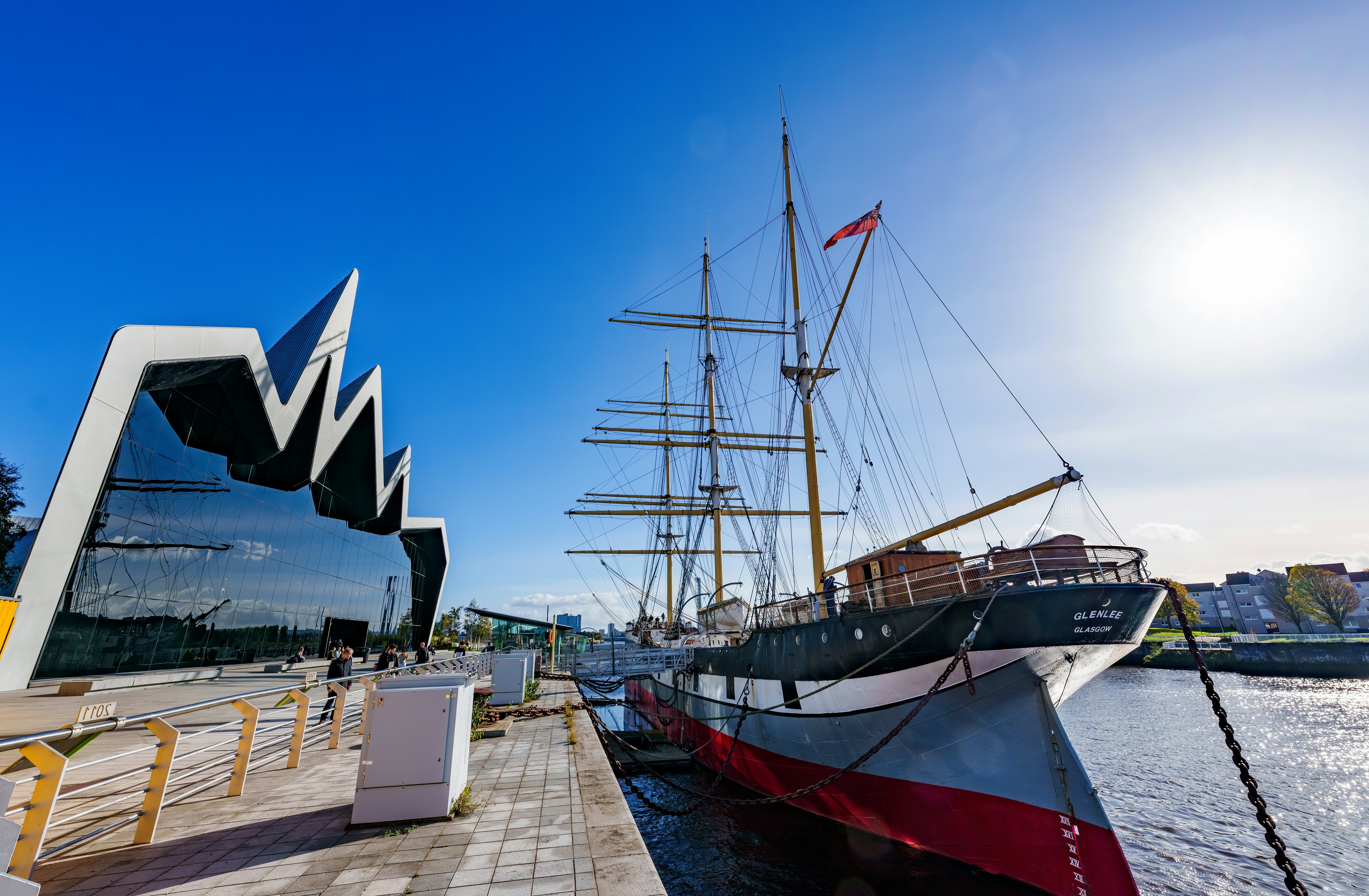 The frontage of the Riverside Museum and the tall ship Glenlee in Glasgow Harbour, Glasgow Scotland.
