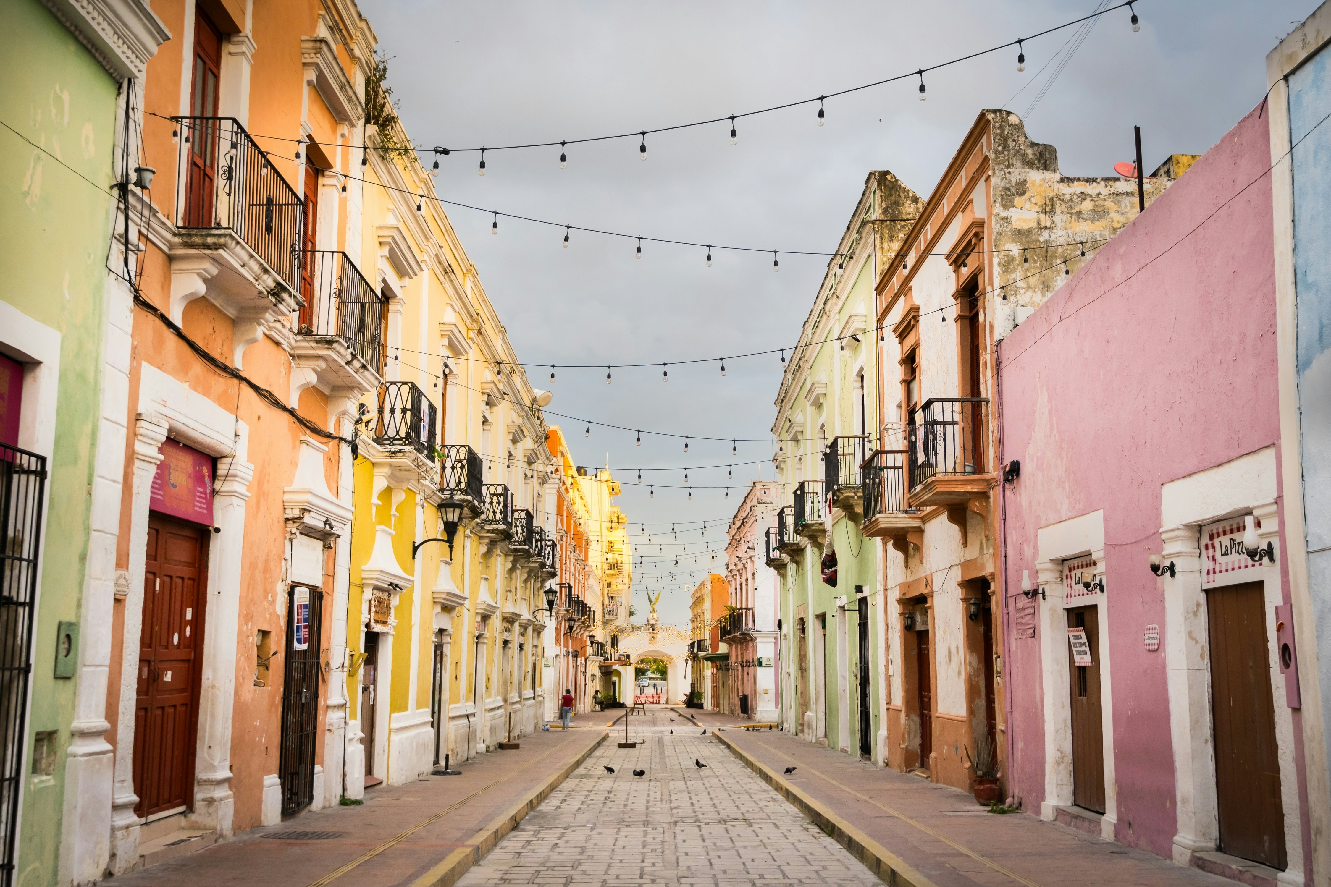 Colorful buildings down a street in Campeche