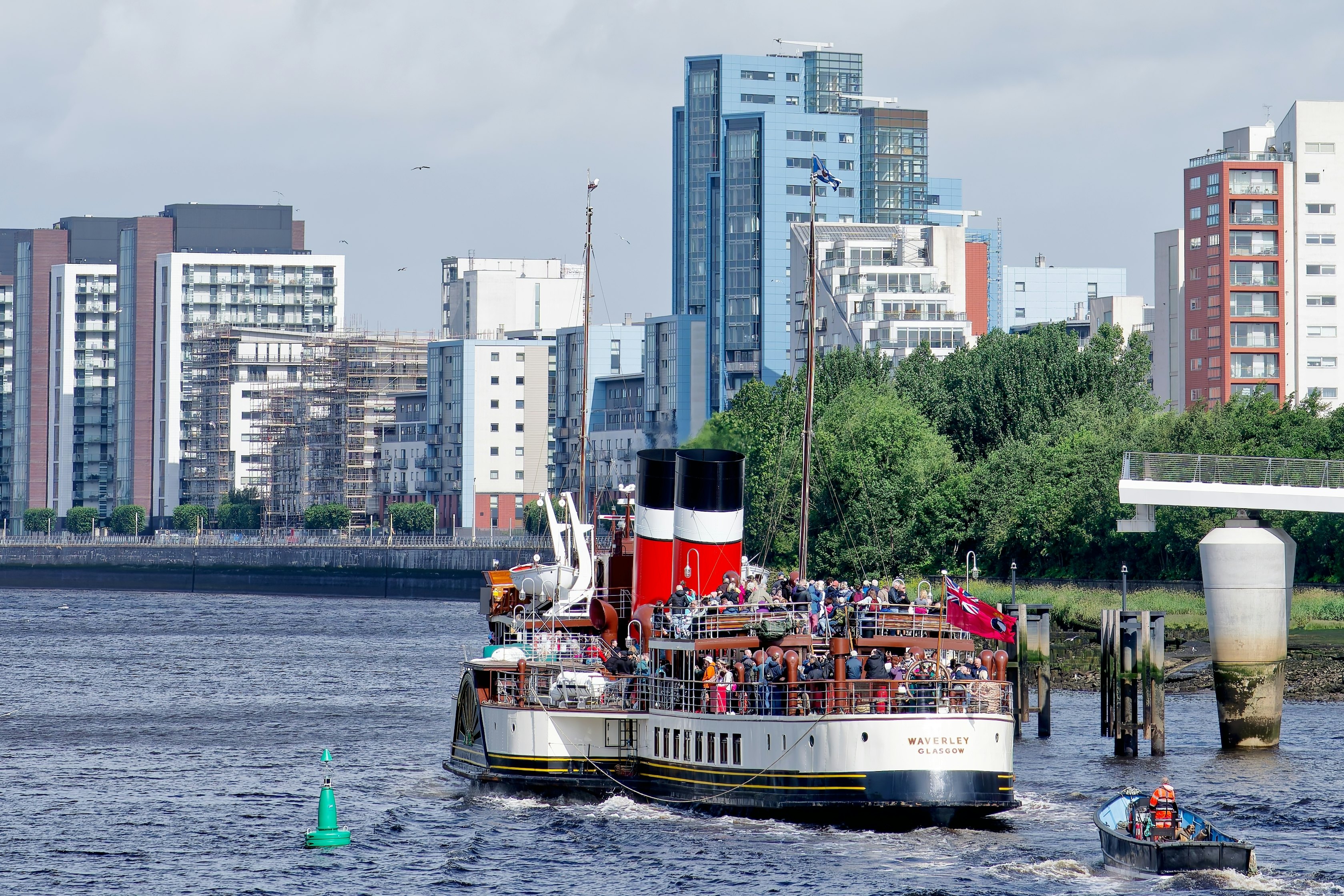 The Waverley paddle steamboat navigating the River Clyde in Glasgow, Scotland.