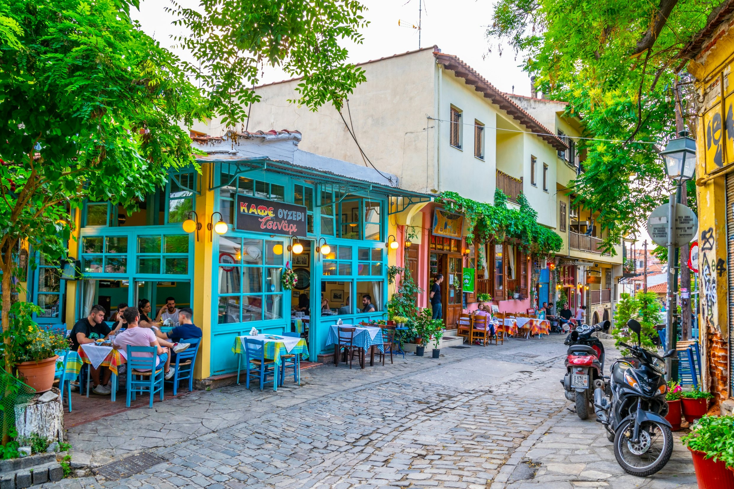 Colorful buildings on a gray stone street