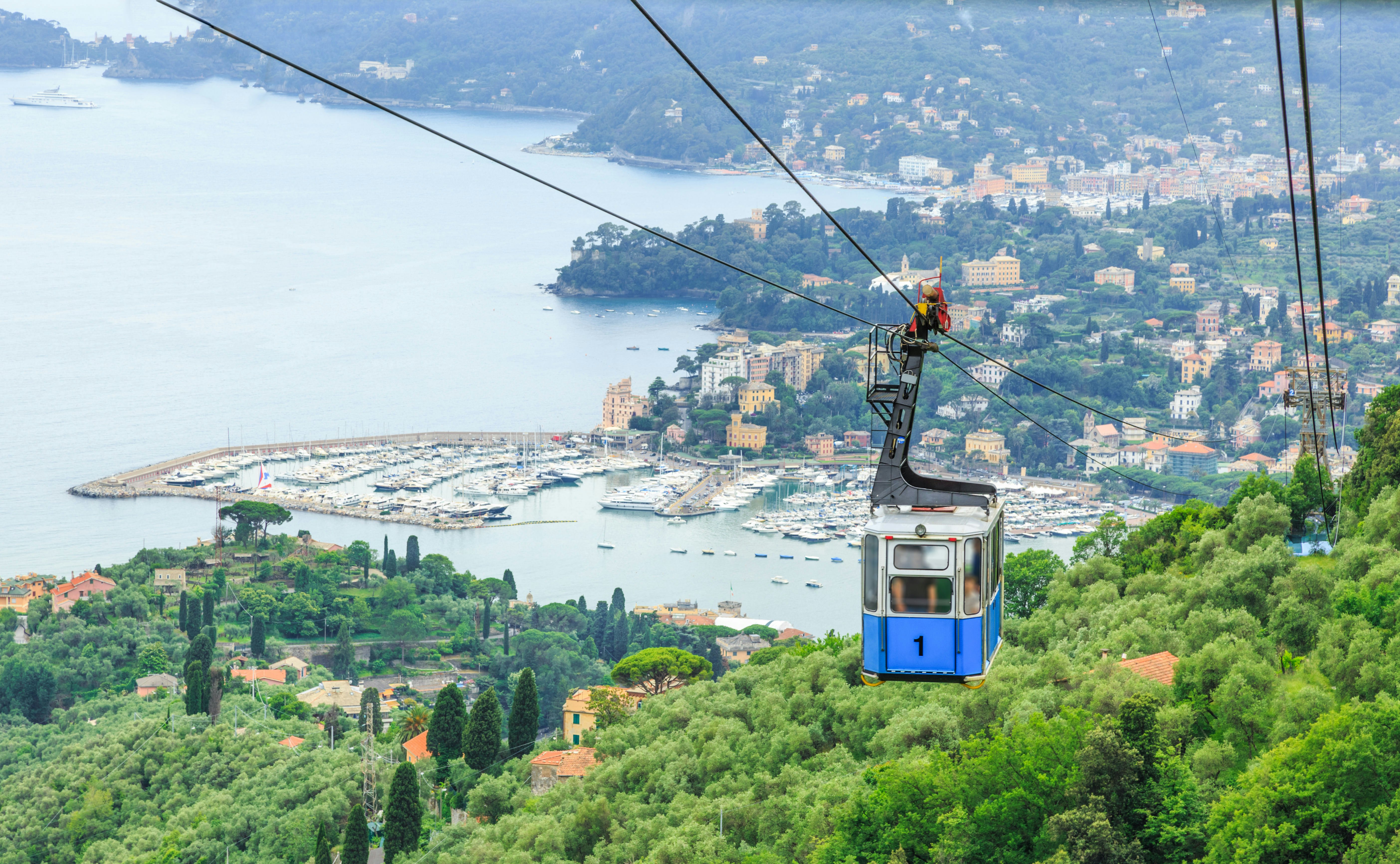 A cable car above the town of Rapallo on the Portofino Peninsula, Liguria, Italy.
