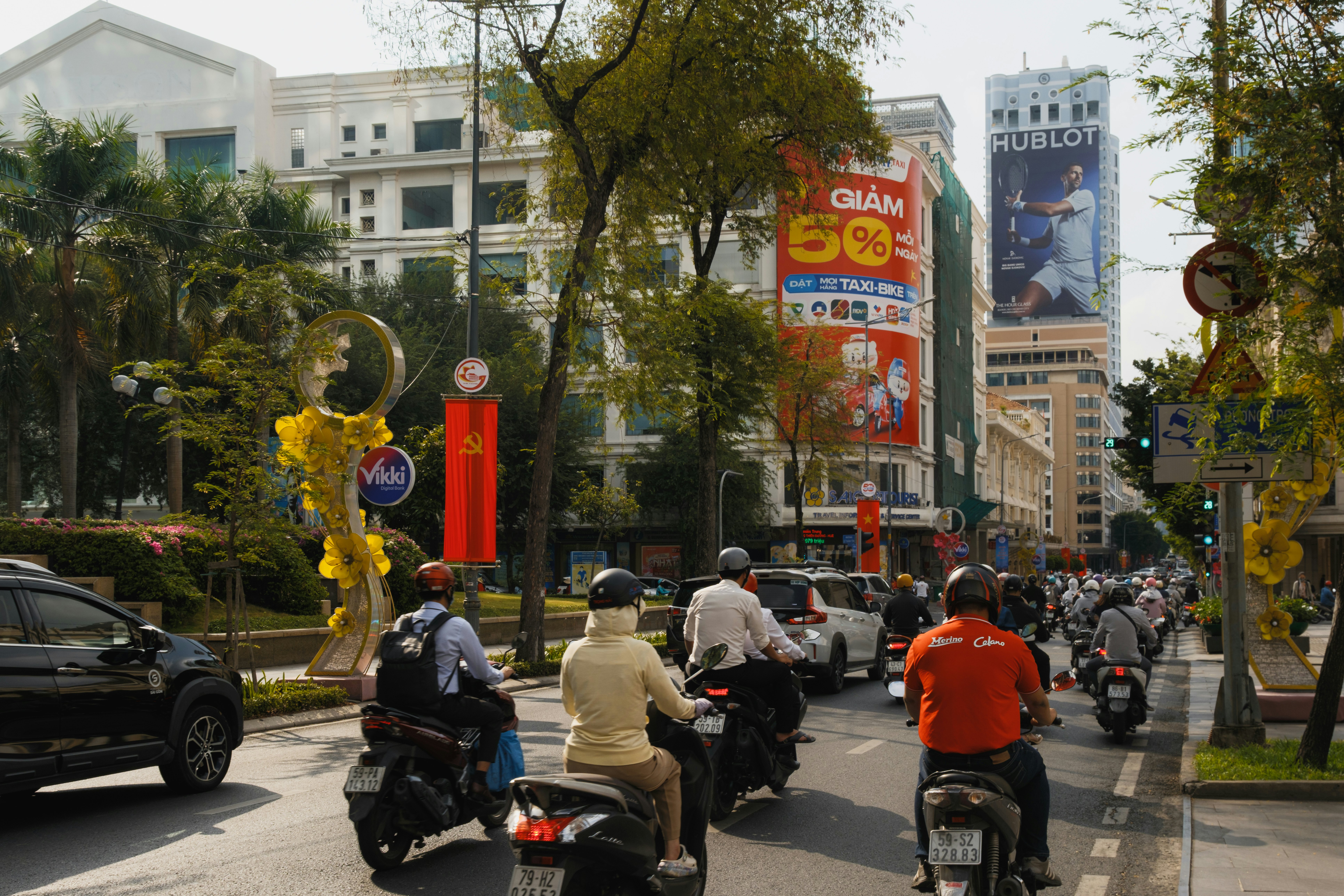 People riding motorbikes on Dong Khoi street