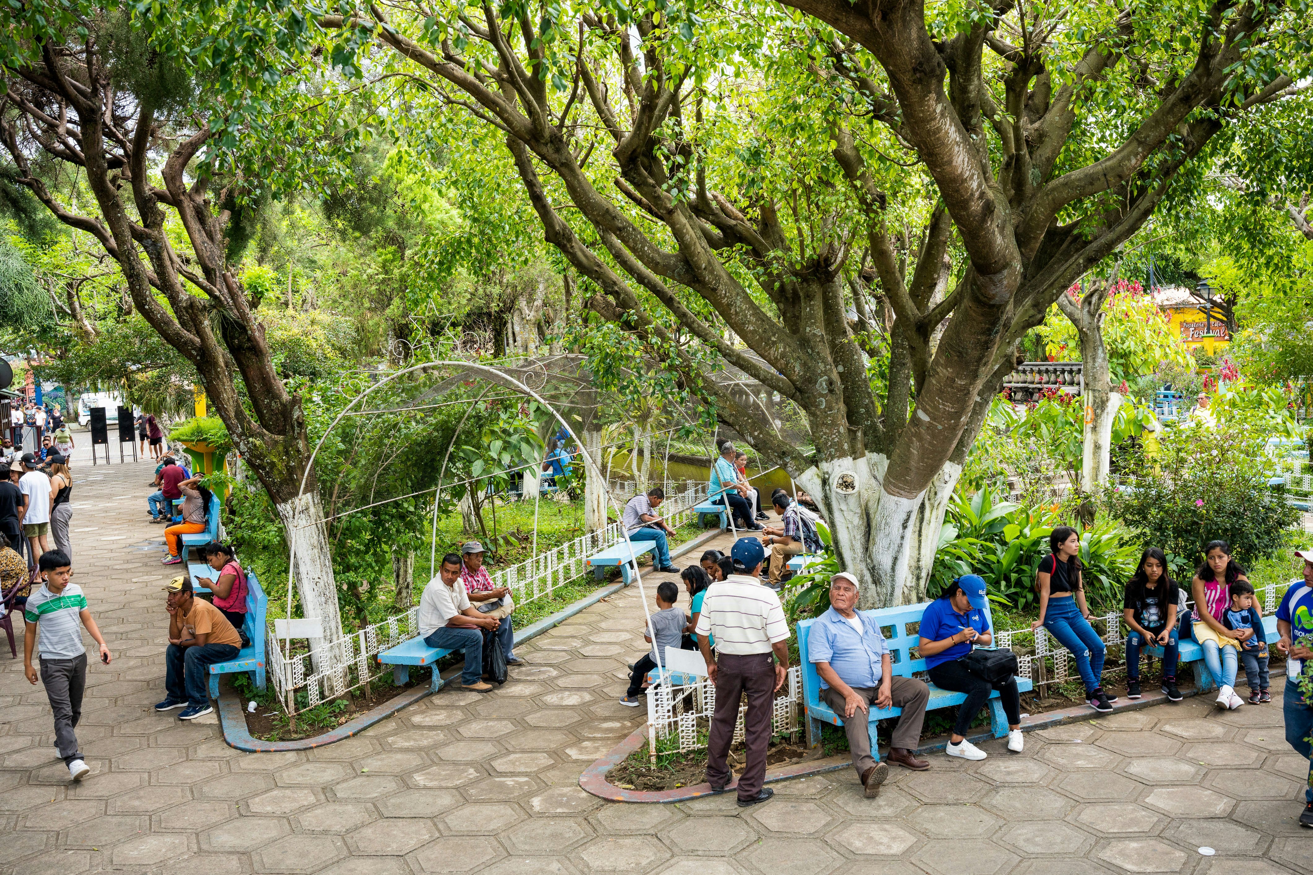 People in a public park in Juayúa, a small mountain town about 50 miles from San Salvador, El Salvador.